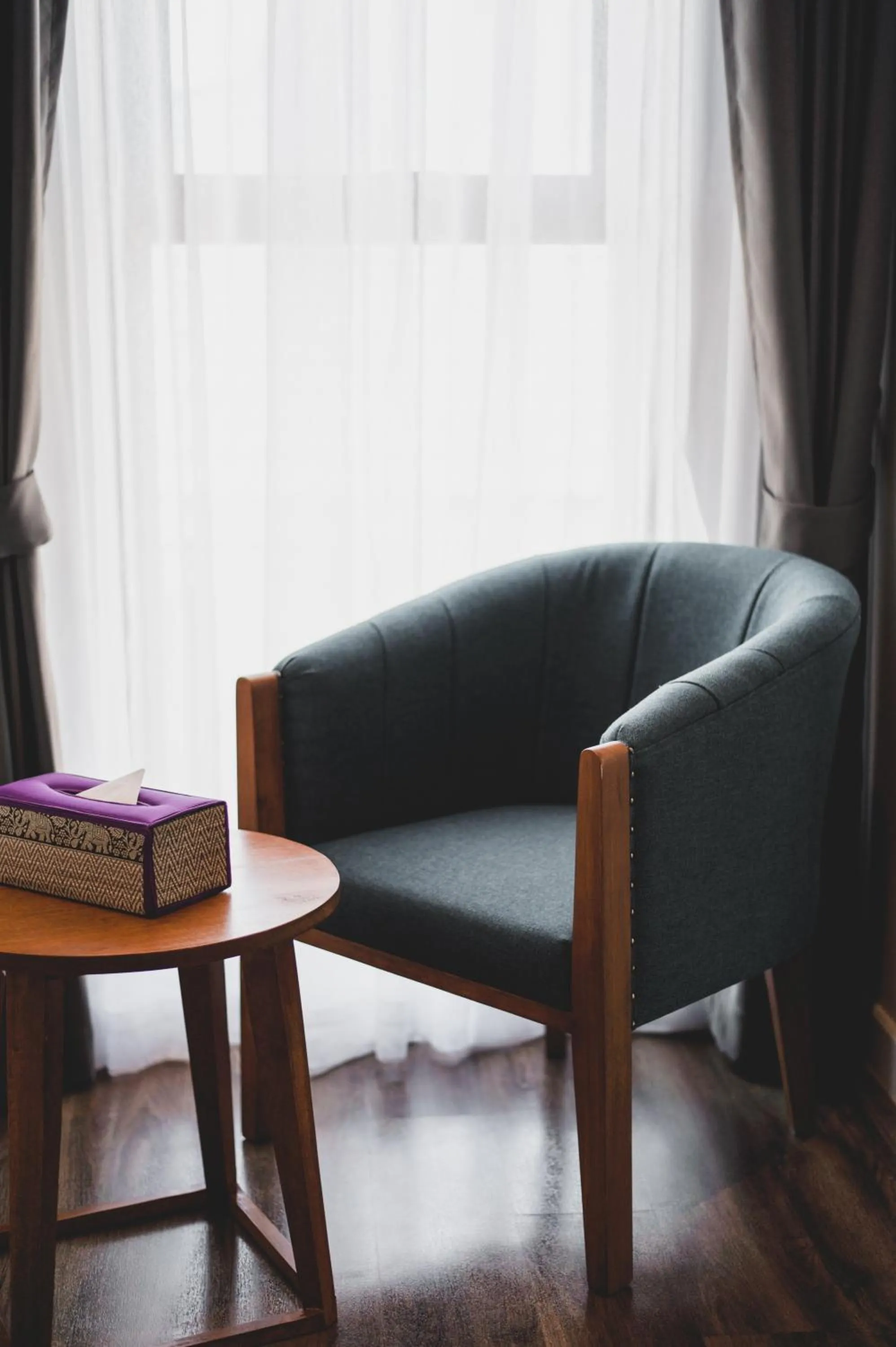 Seating area in The Wing Boutique Hotel