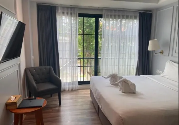 Bedroom, Bed in The Wing Boutique Hotel