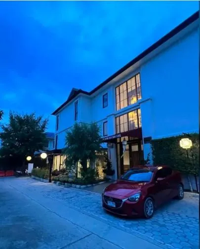 Property building in The Wing Boutique Hotel