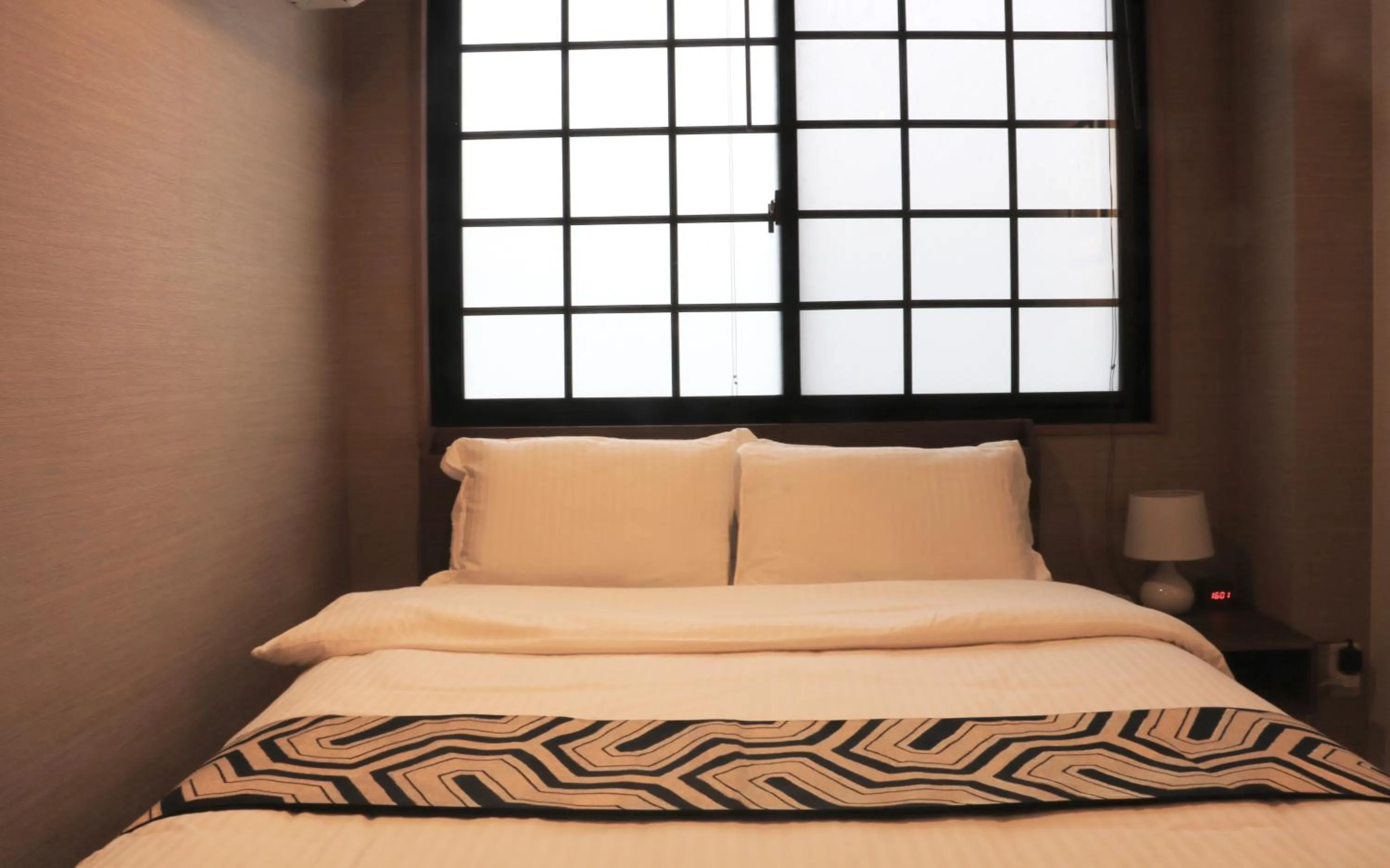 Bed in Hotel Traveling Bridge Nijojo