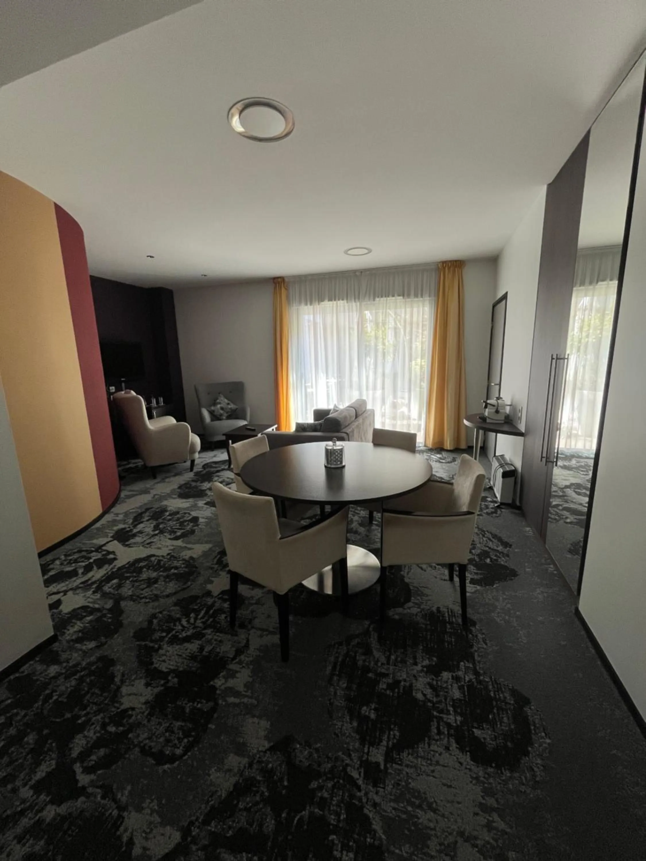 Bedroom in Logis Hôtel Victor Hugo & Spa