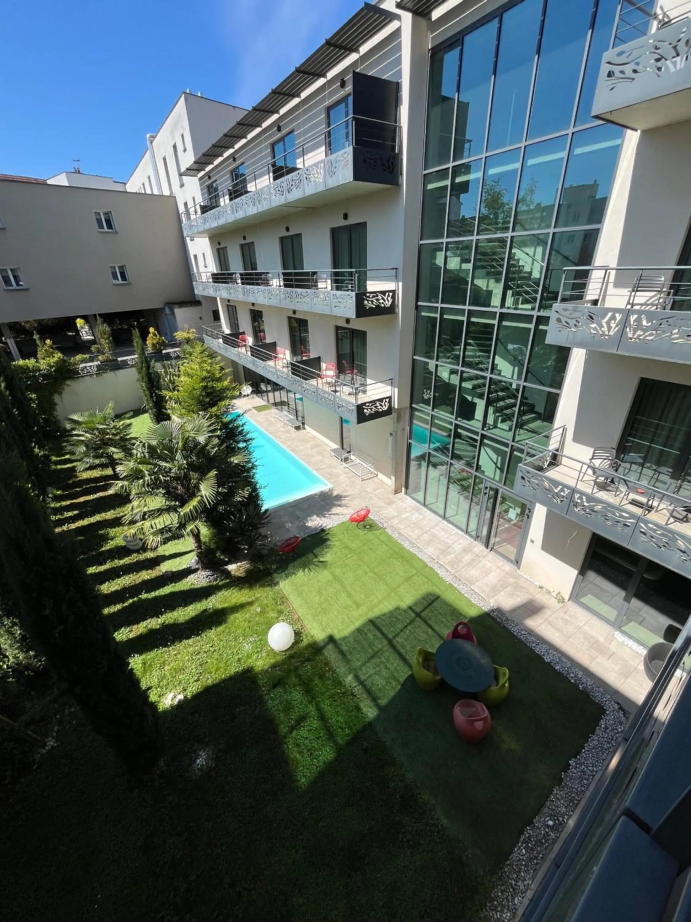Pool view in Logis Hôtel Victor Hugo & Spa