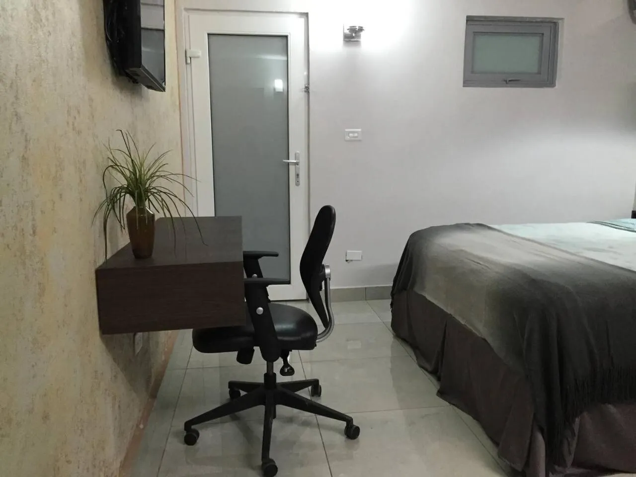 Bed in SEGOVIA STUDIO UNITS