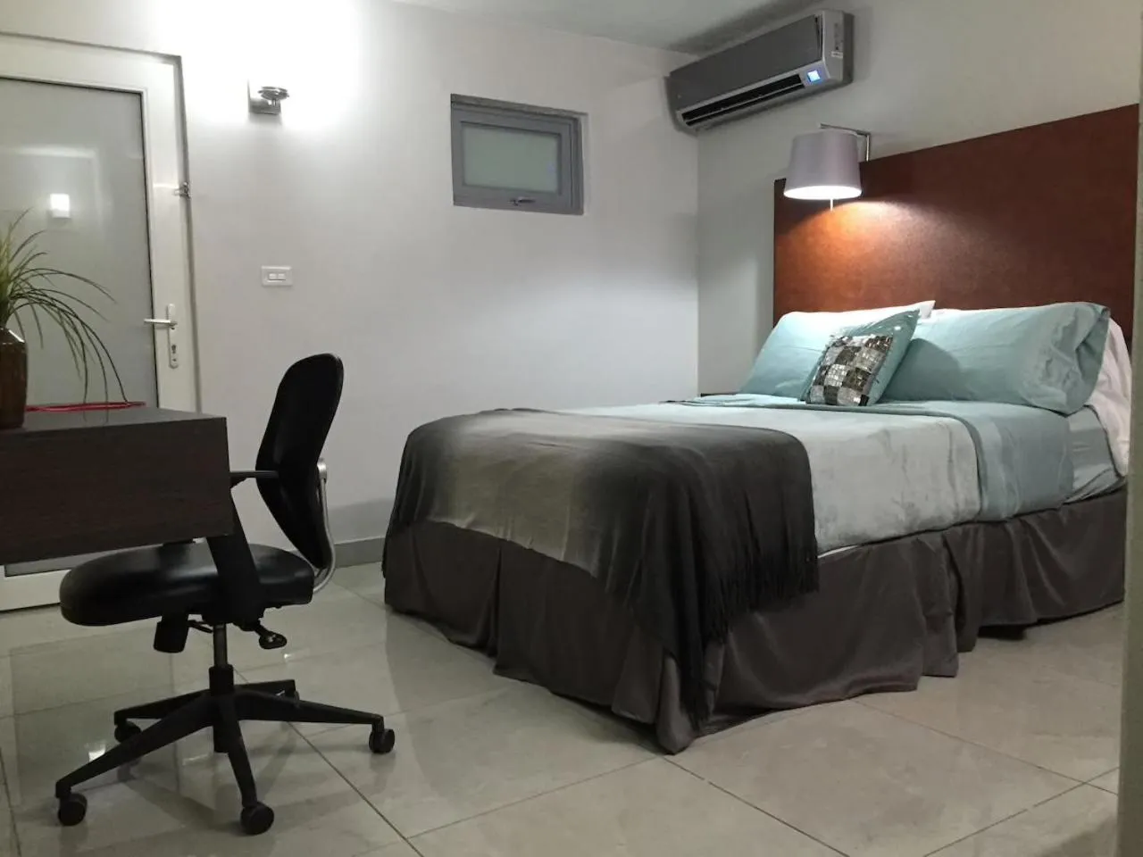 Bed in SEGOVIA STUDIO UNITS