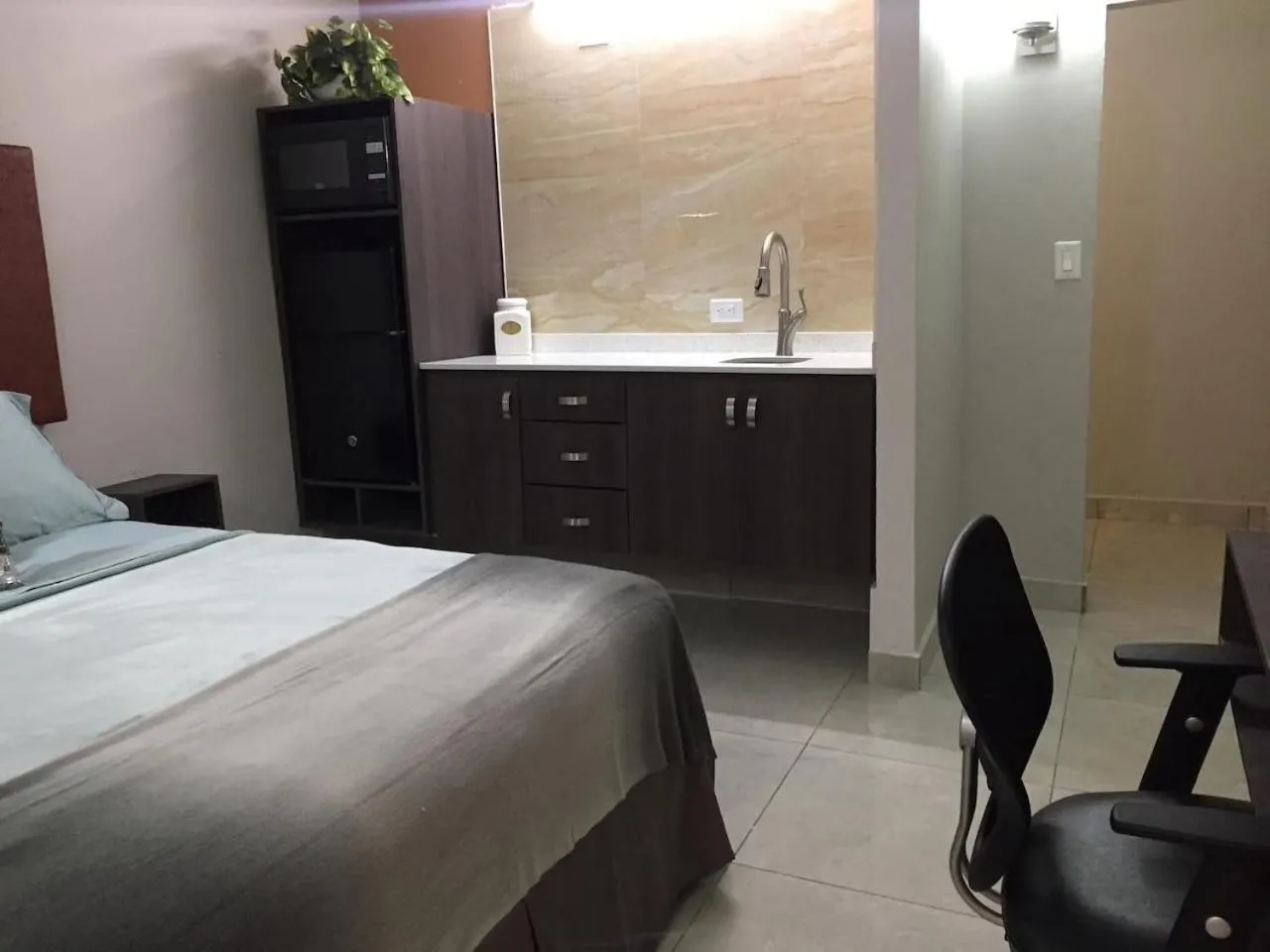 Bed in SEGOVIA STUDIO UNITS