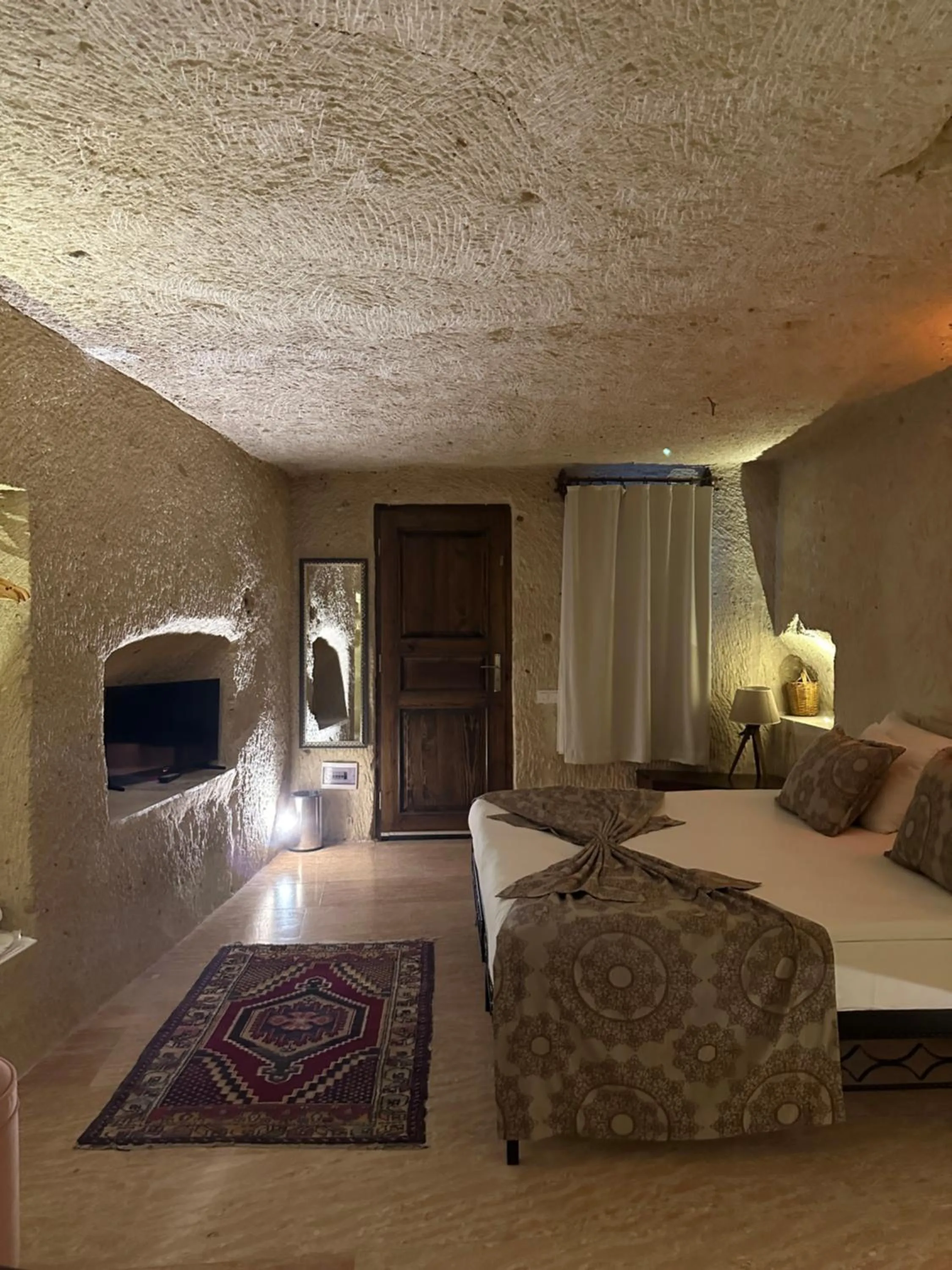 Living room, Bed in Ortahisar Cave Hotel