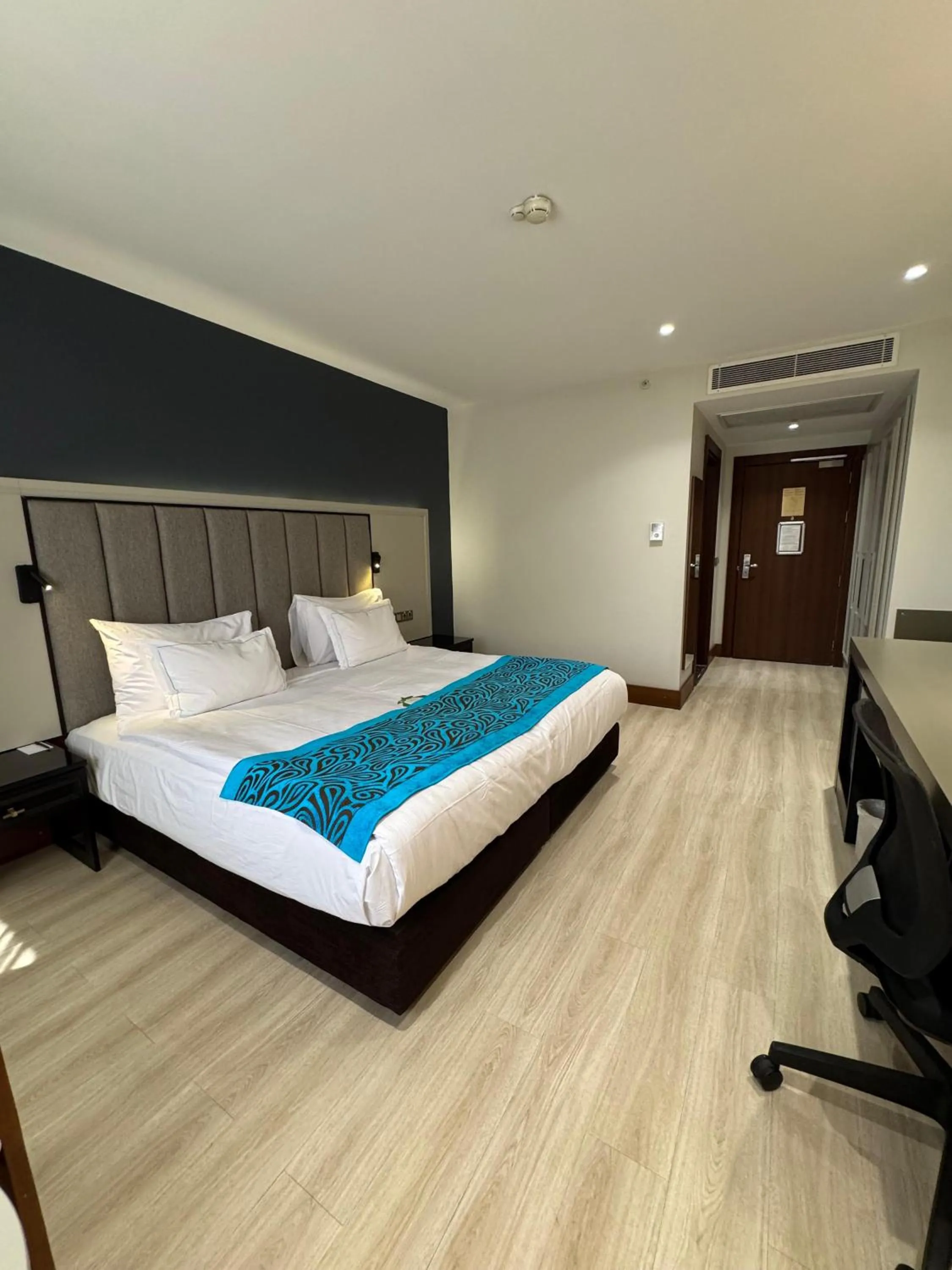 Bed in Teymur Continental Hotel