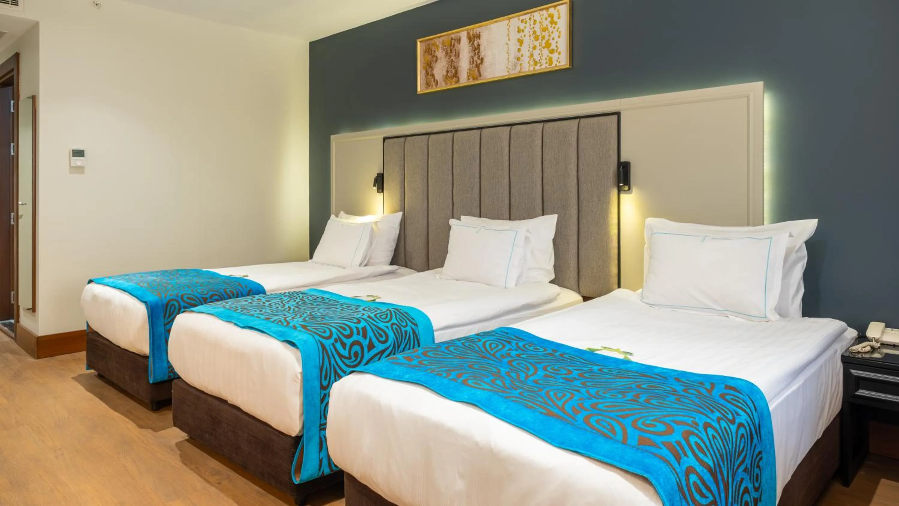 Bed in Teymur Continental Hotel