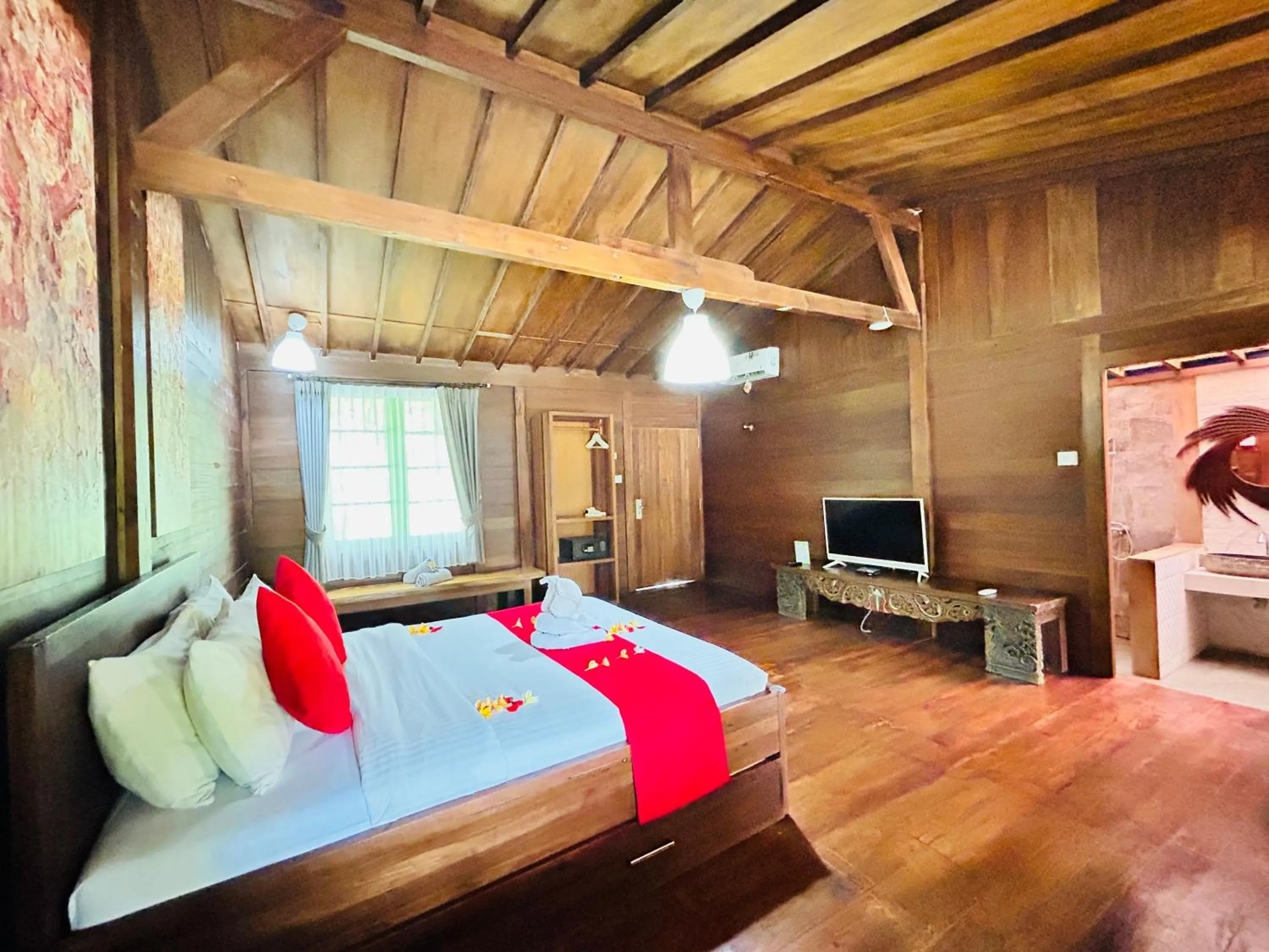 Bed in Avery Coconut Island Waterpark Beach Resort Carita