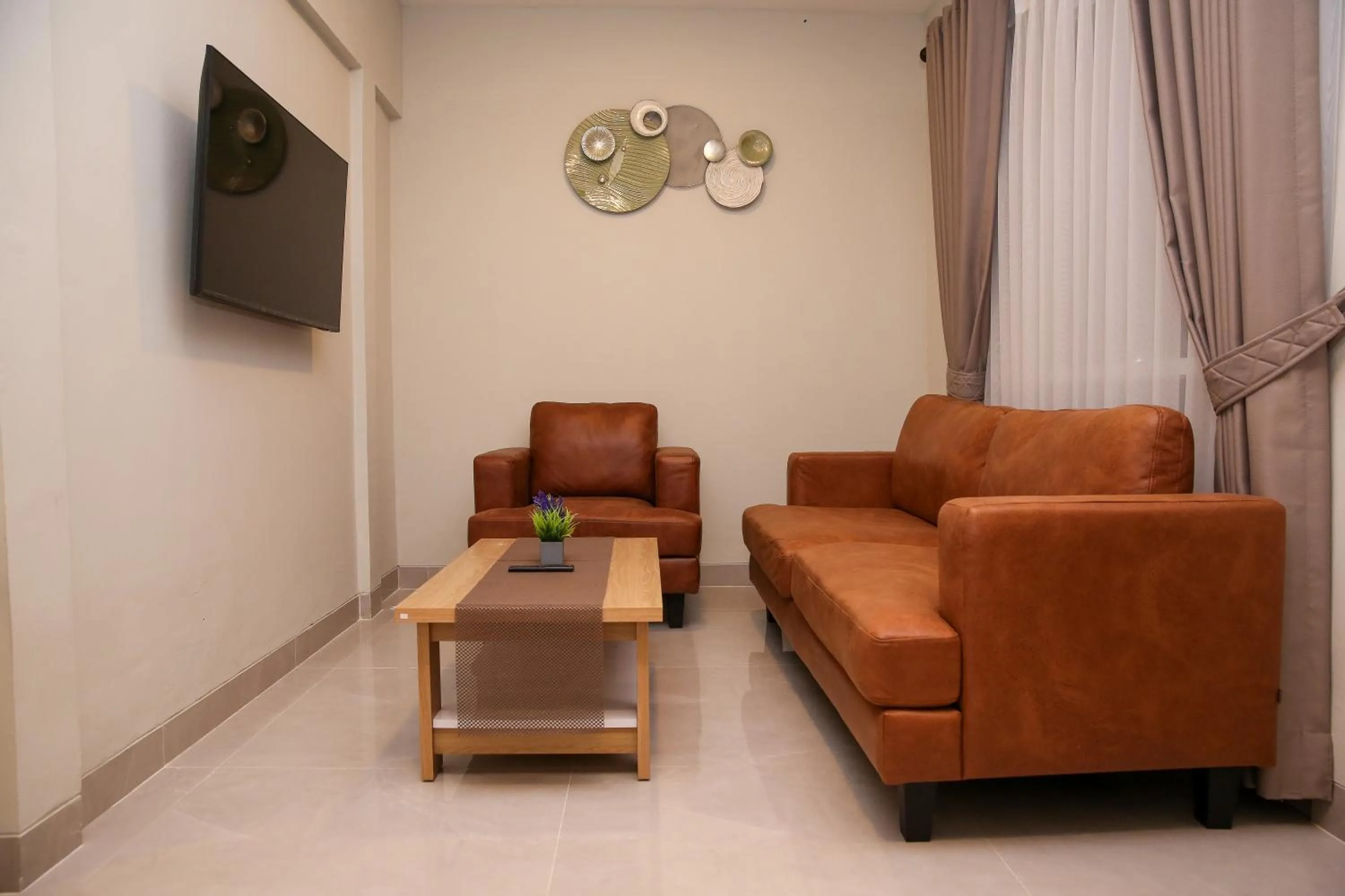 Living room in Avery Coconut Island Waterpark Beach Resort Carita