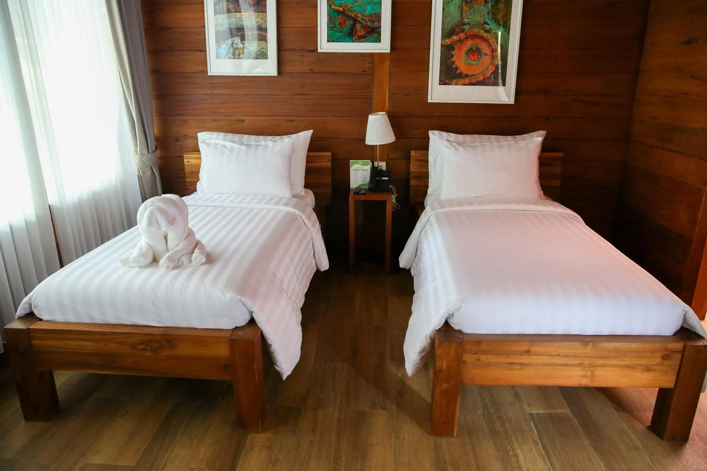 Bed in Avery Coconut Island Waterpark Beach Resort Carita