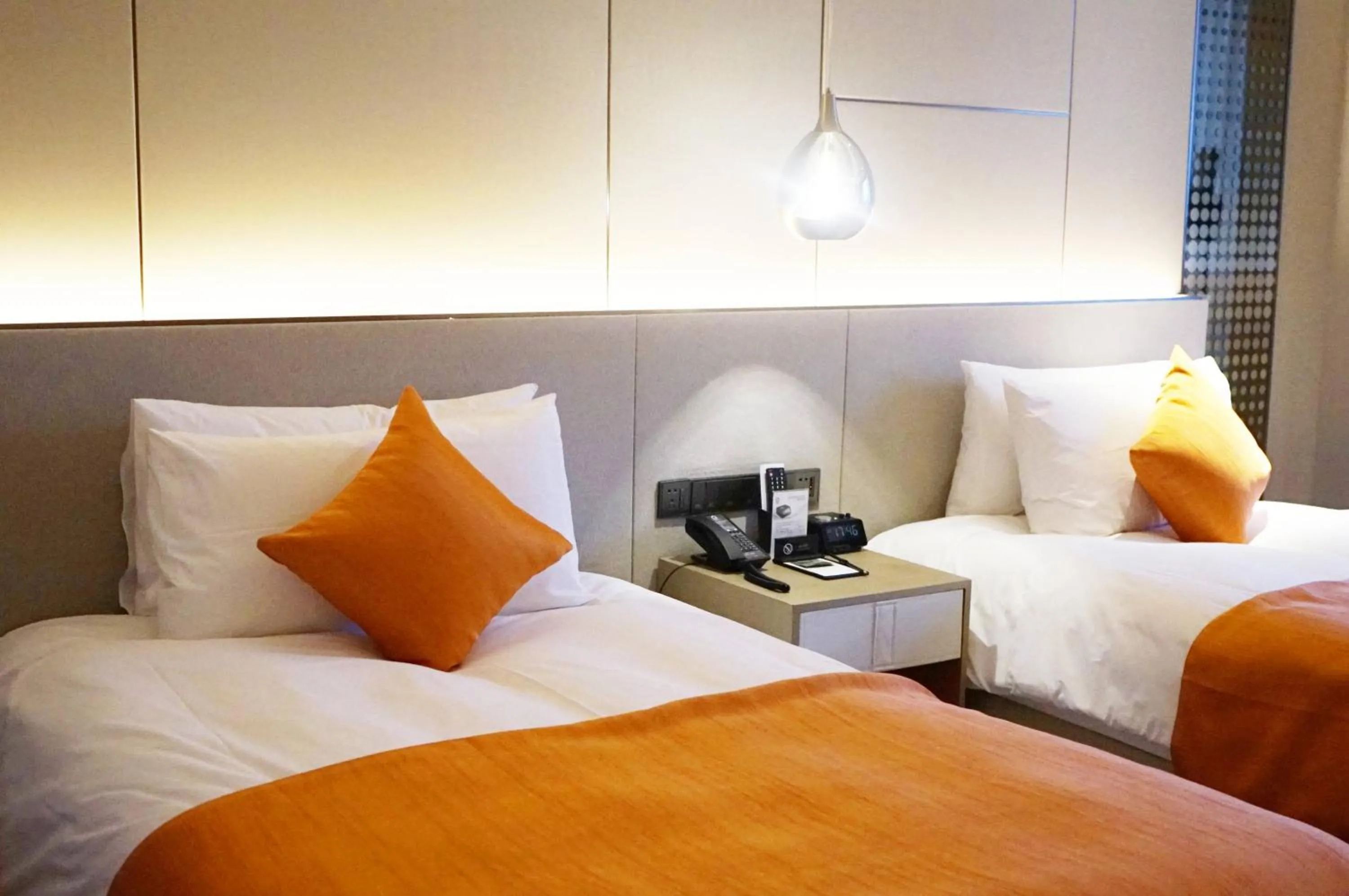 Bed in The QUBE Hotel Ningbo North