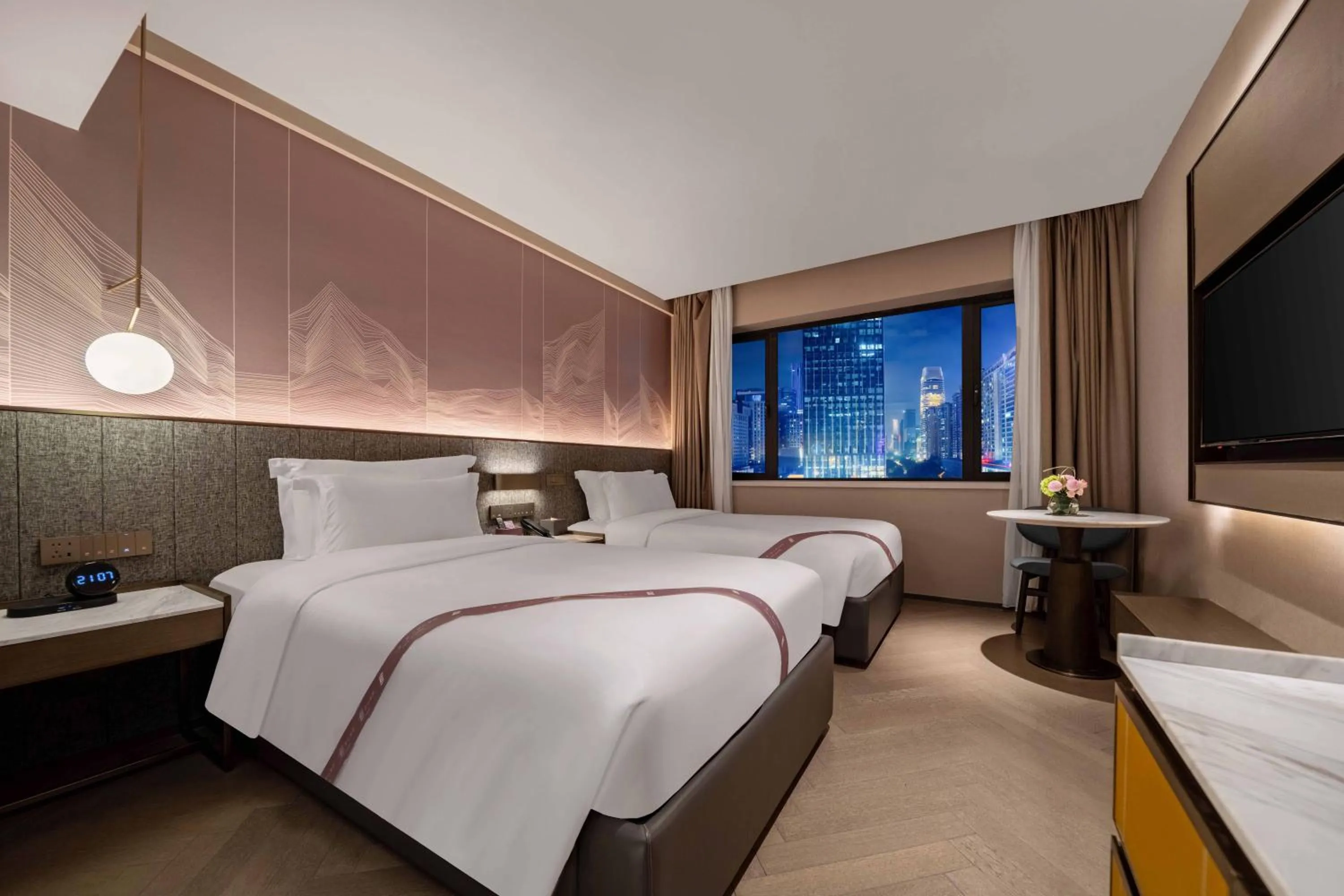 Bed in Imperial Traders Elong Hotel