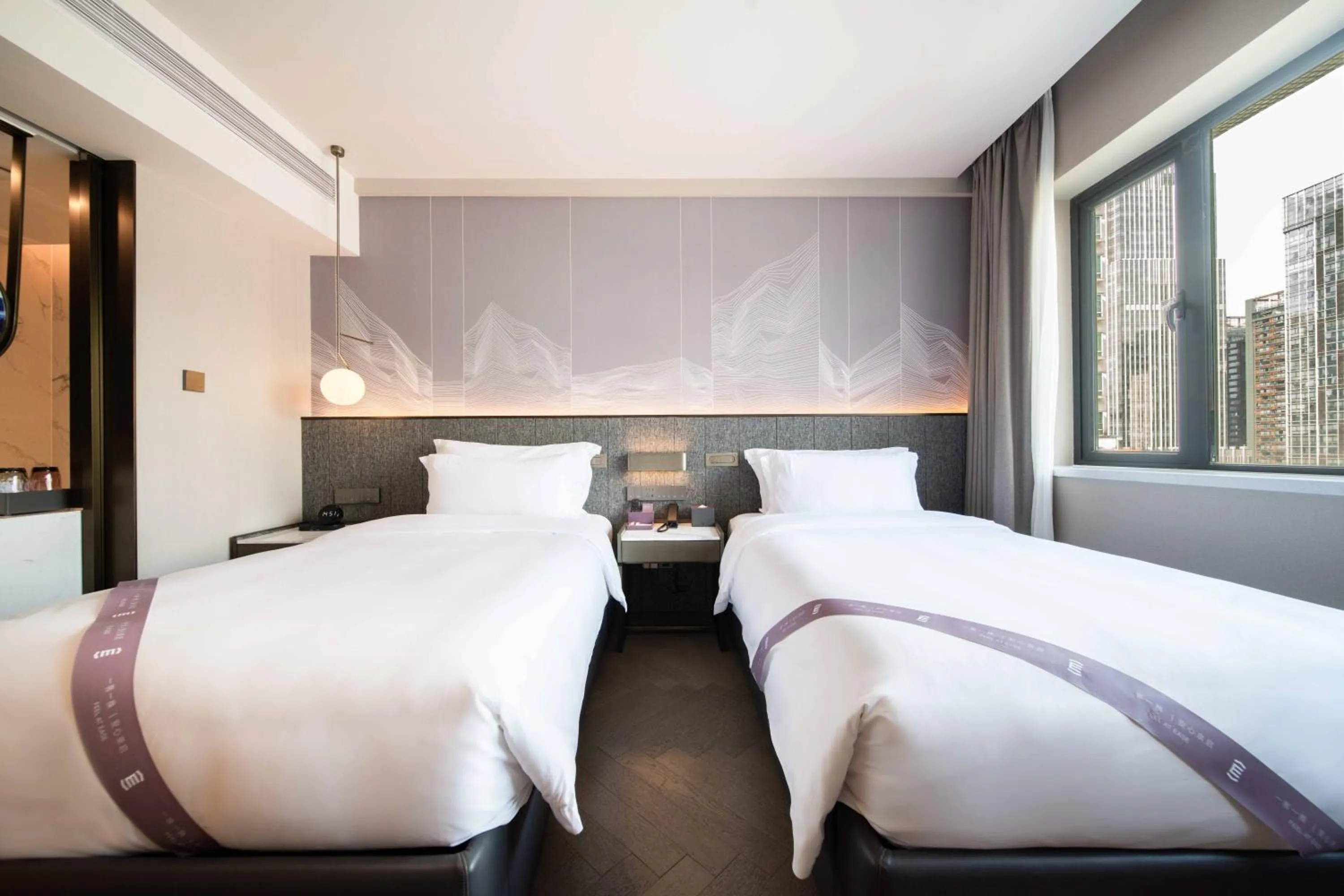 Bed in Imperial Traders Elong Hotel