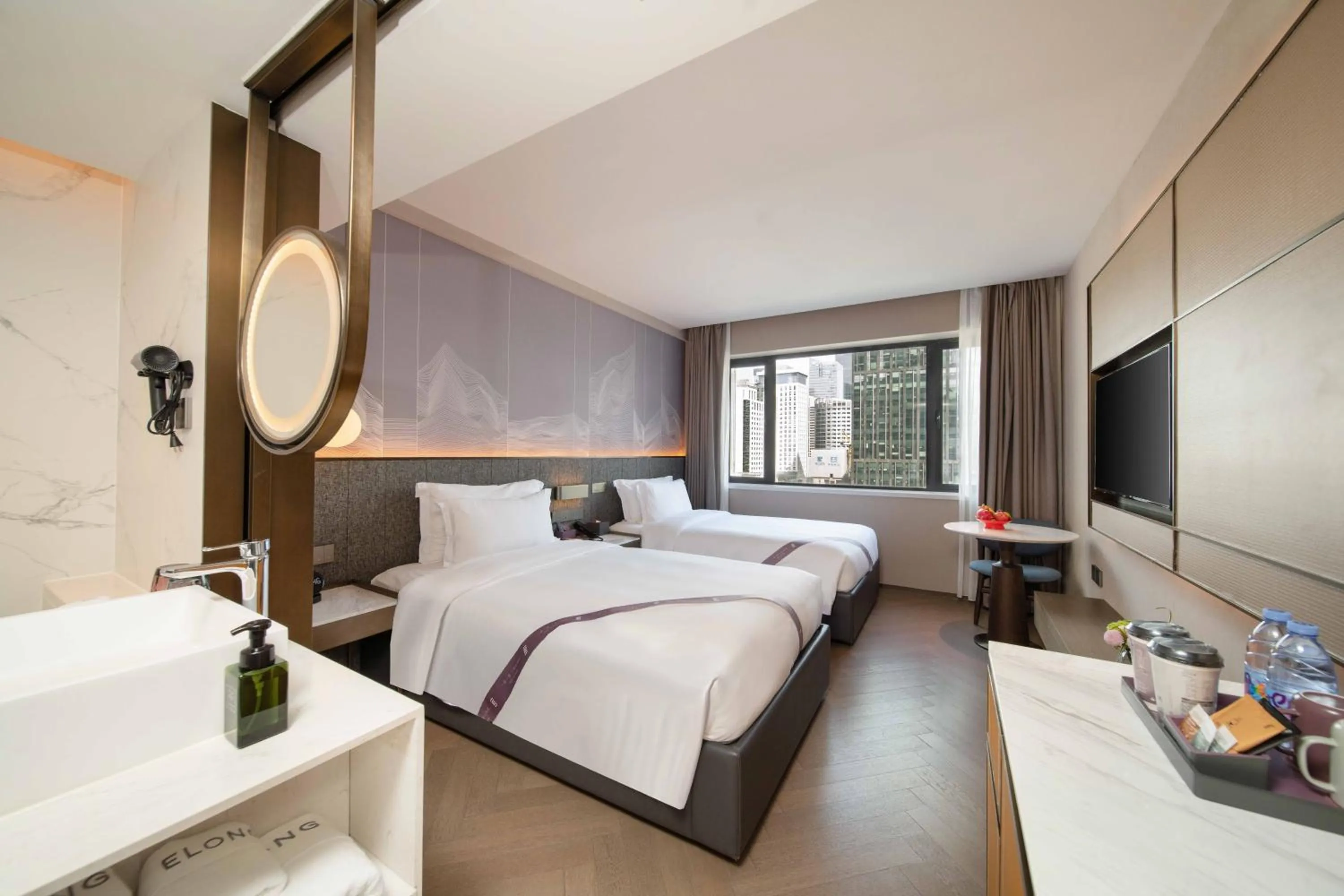 Bed in Imperial Traders Elong Hotel