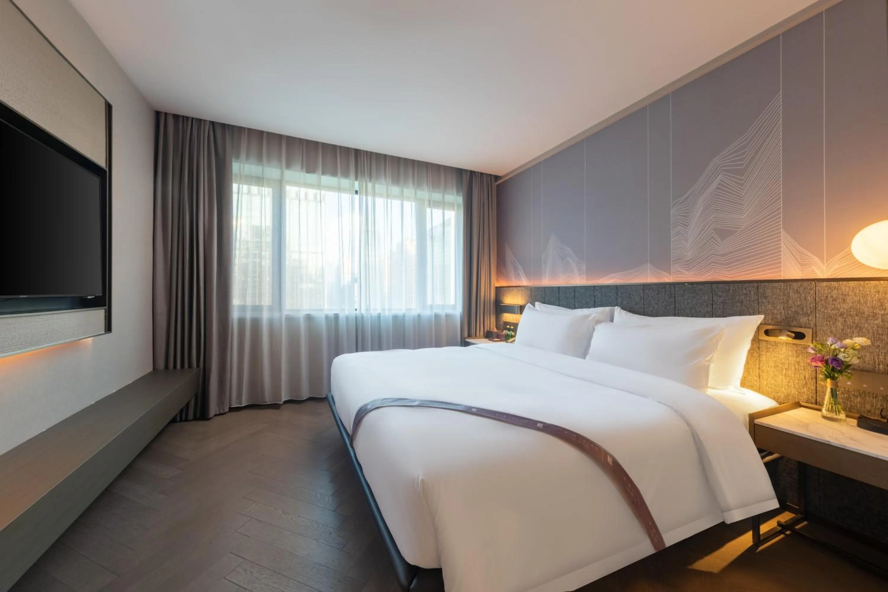 Bed in Amber East Hotel