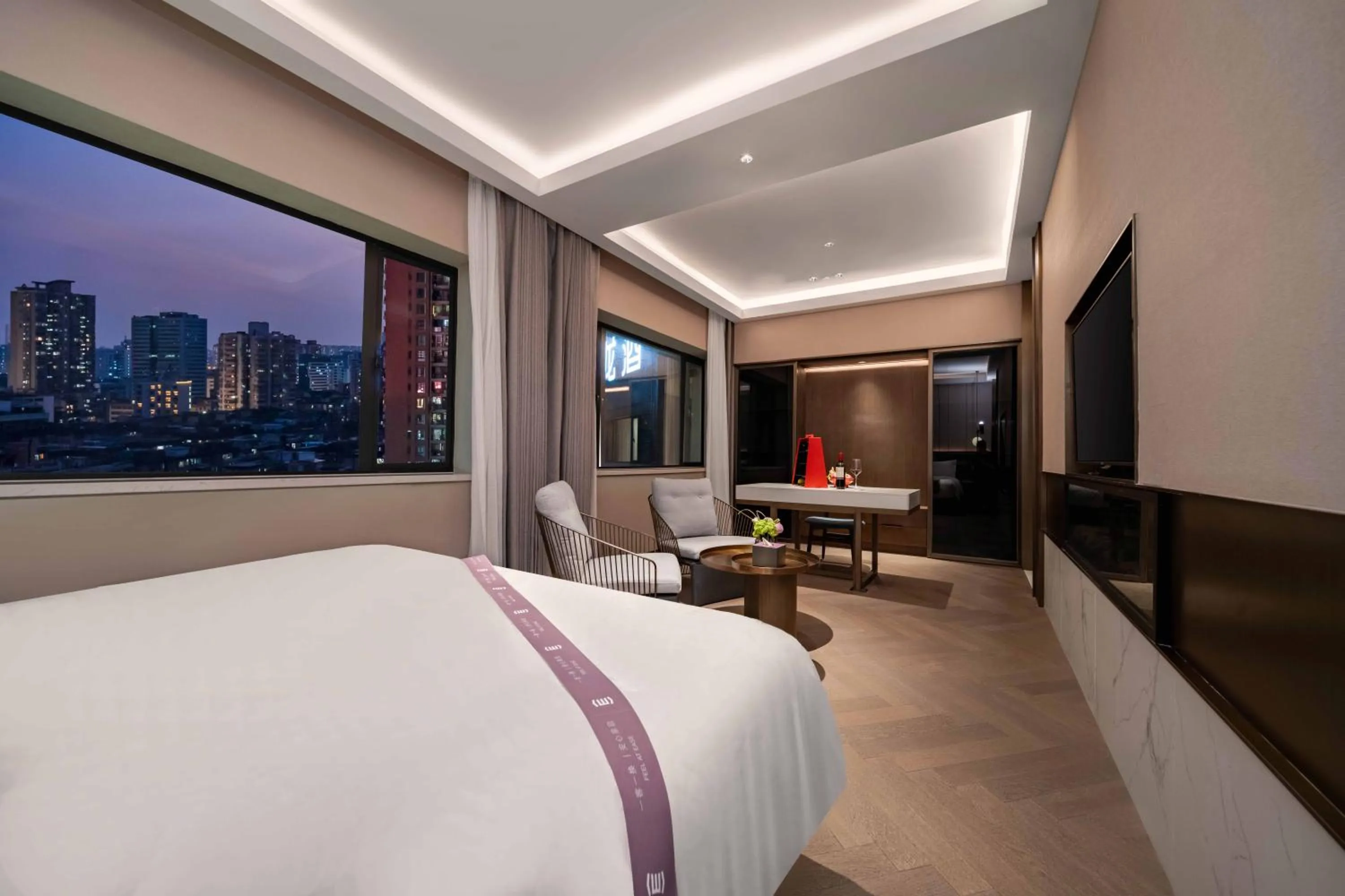 Bed in Imperial Traders Elong Hotel