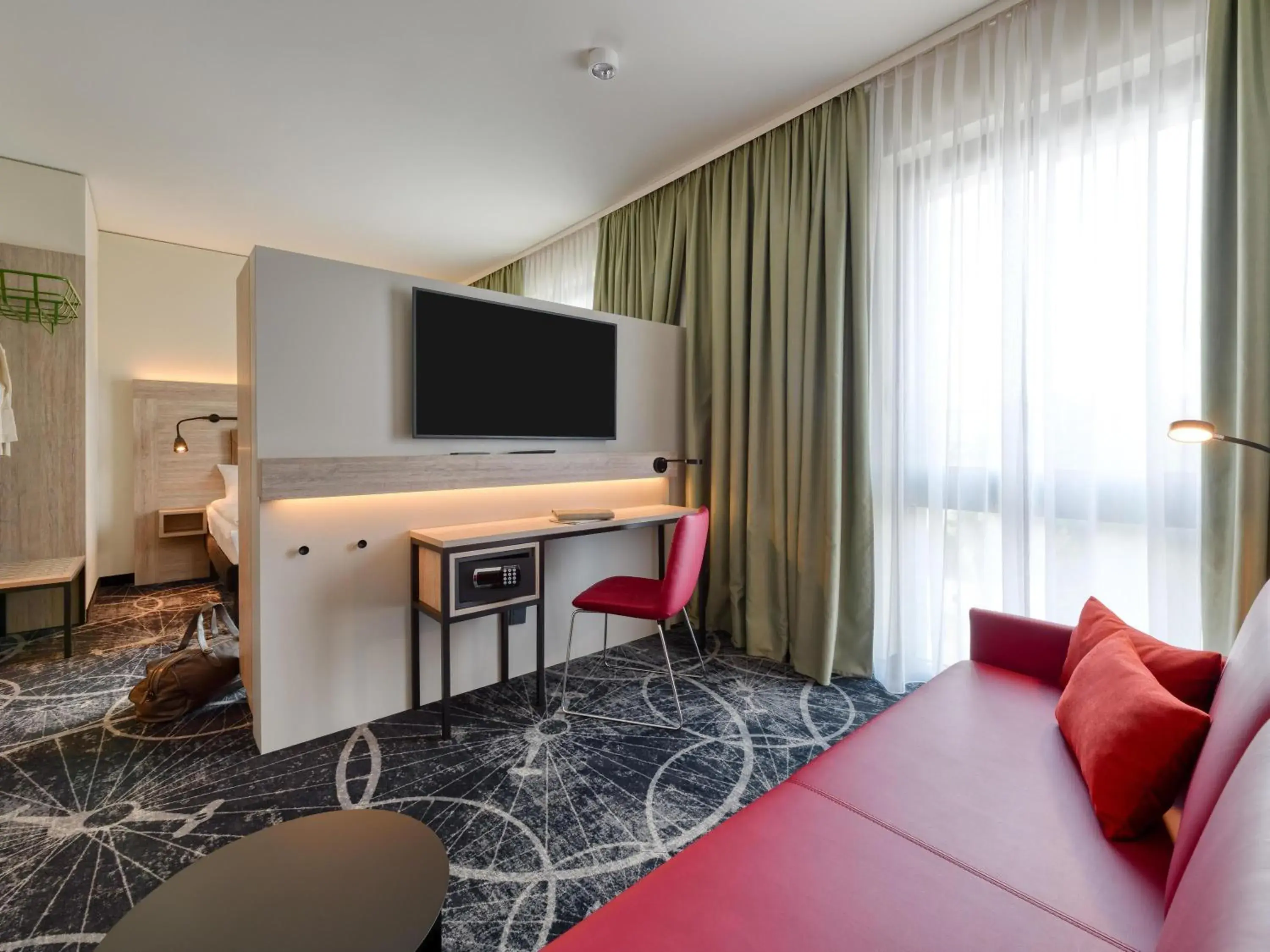 Family Room with double bed and sofa bed in ibis Styles Magdeburg Family Room with double bed and sofa bed in ibis Styles Magdeburg