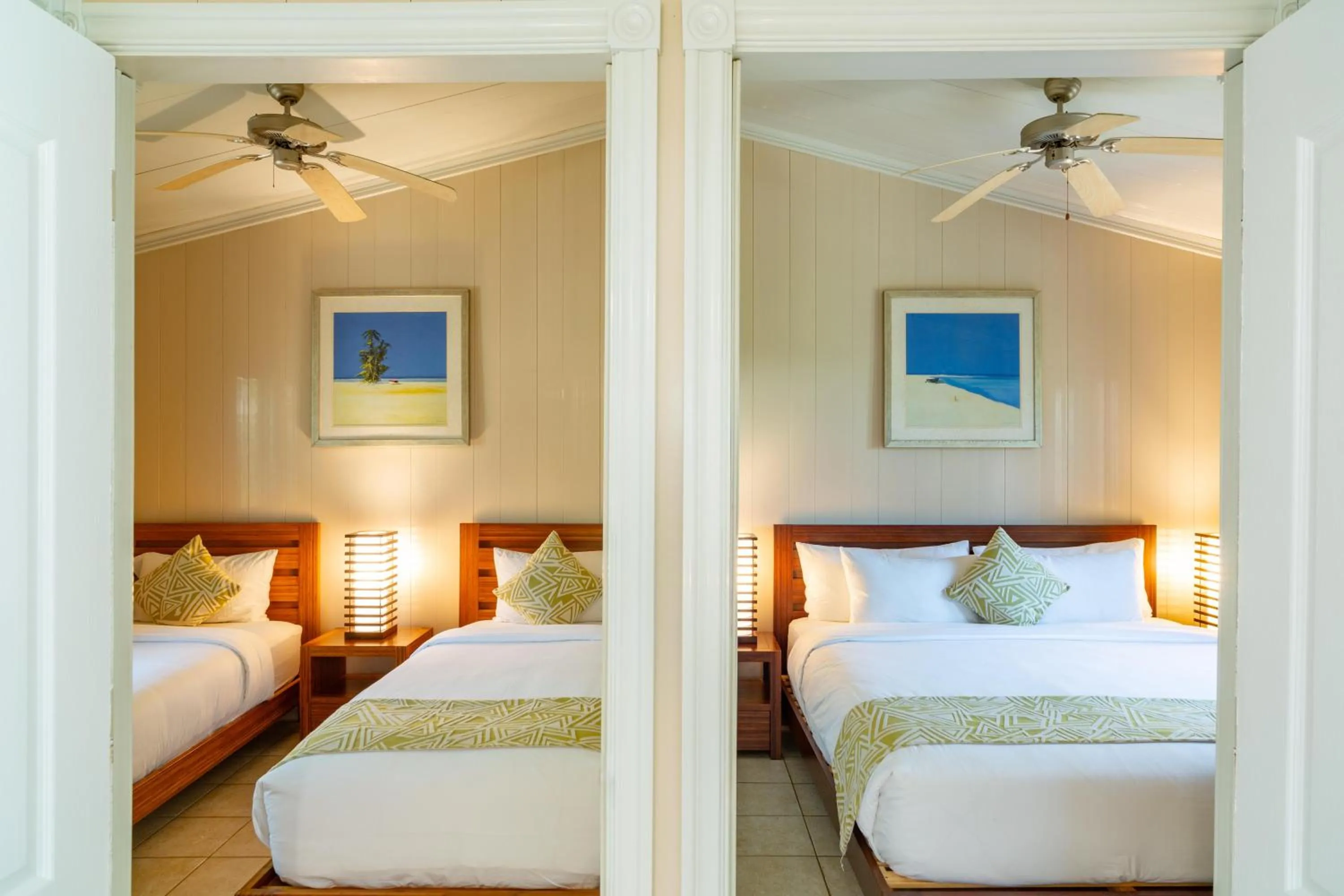 Photo of the whole room, Bed in Kokomo Botanical Resort - Caribbean Family Cottages
