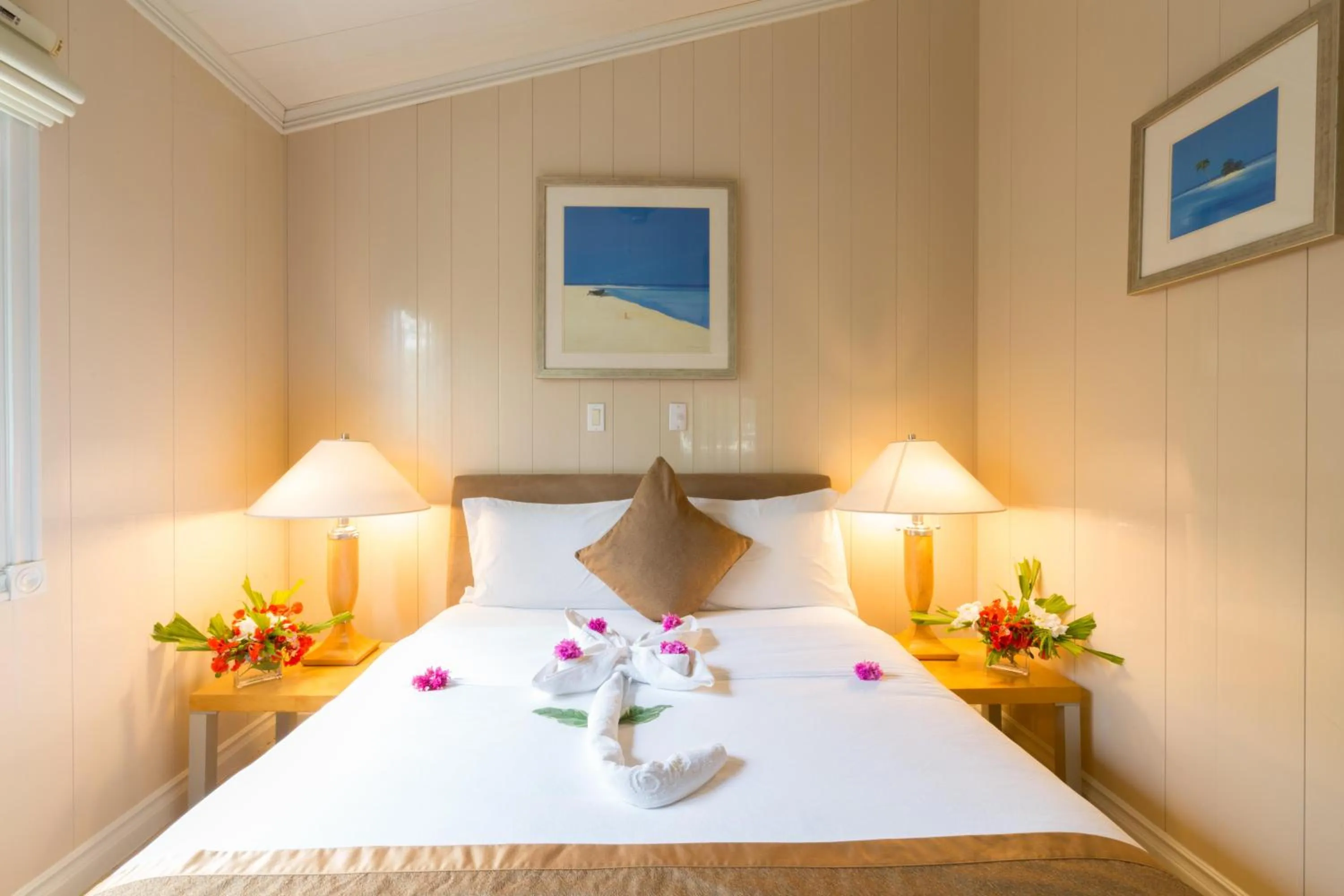 Photo of the whole room, Bed in Kokomo Botanical Resort - Caribbean Family Cottages