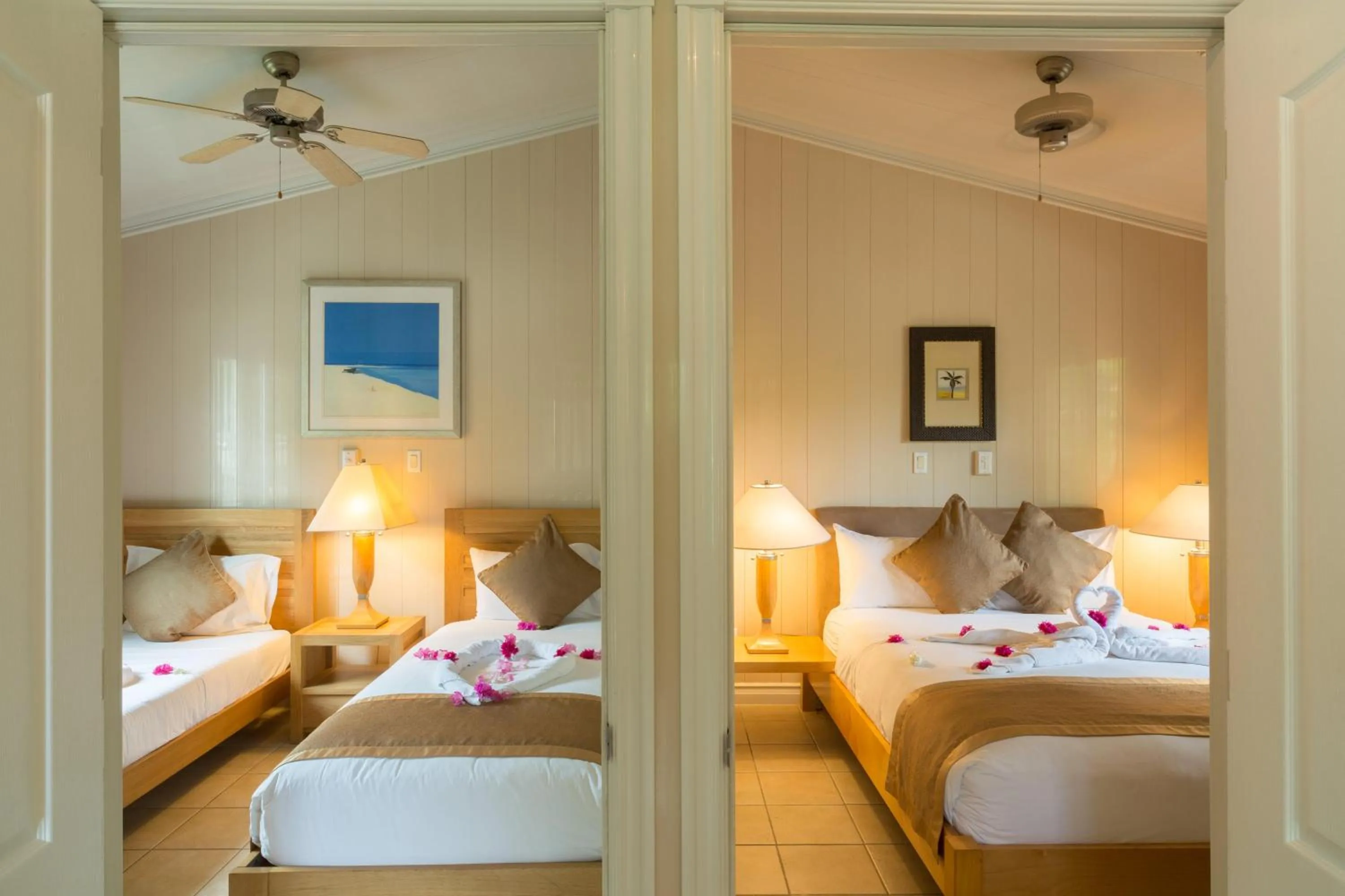 Photo of the whole room, Bed in Kokomo Botanical Resort - Caribbean Family Cottages