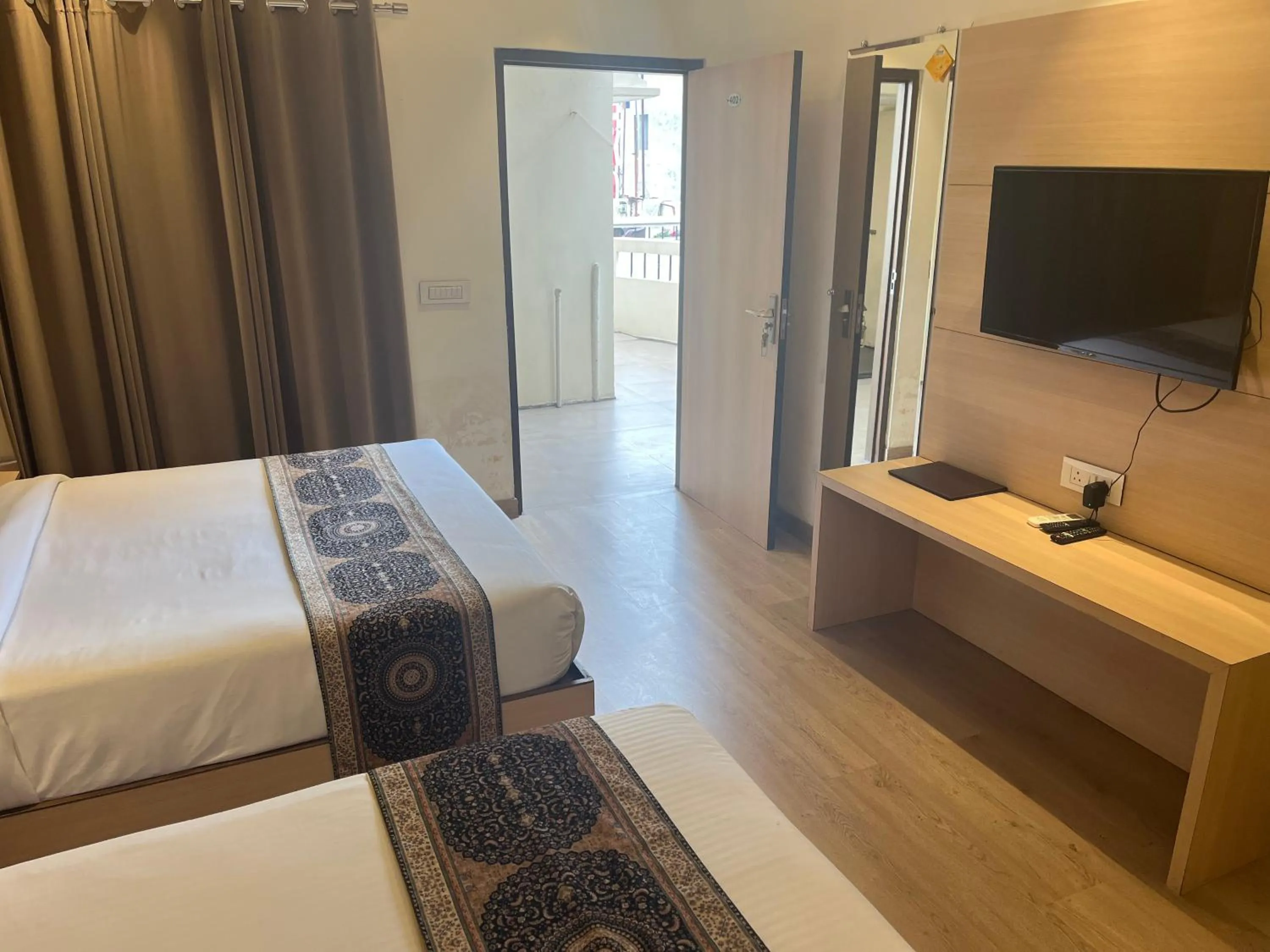 Photo of the whole room, Bed in Hotel Exotic - 5 min walk from Golden Temple