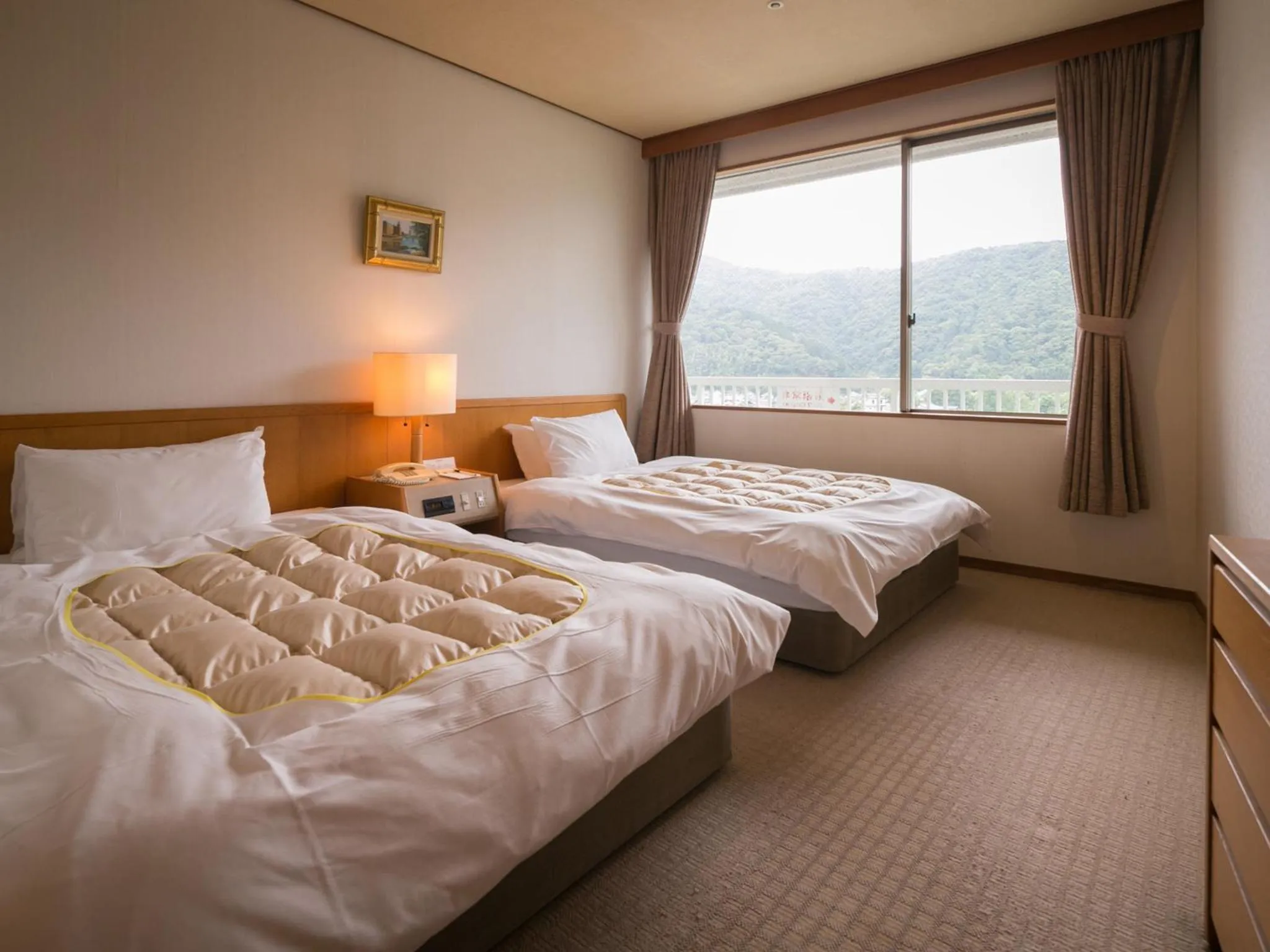 Bed in Iwakuni Kokusai Kanko Hotel