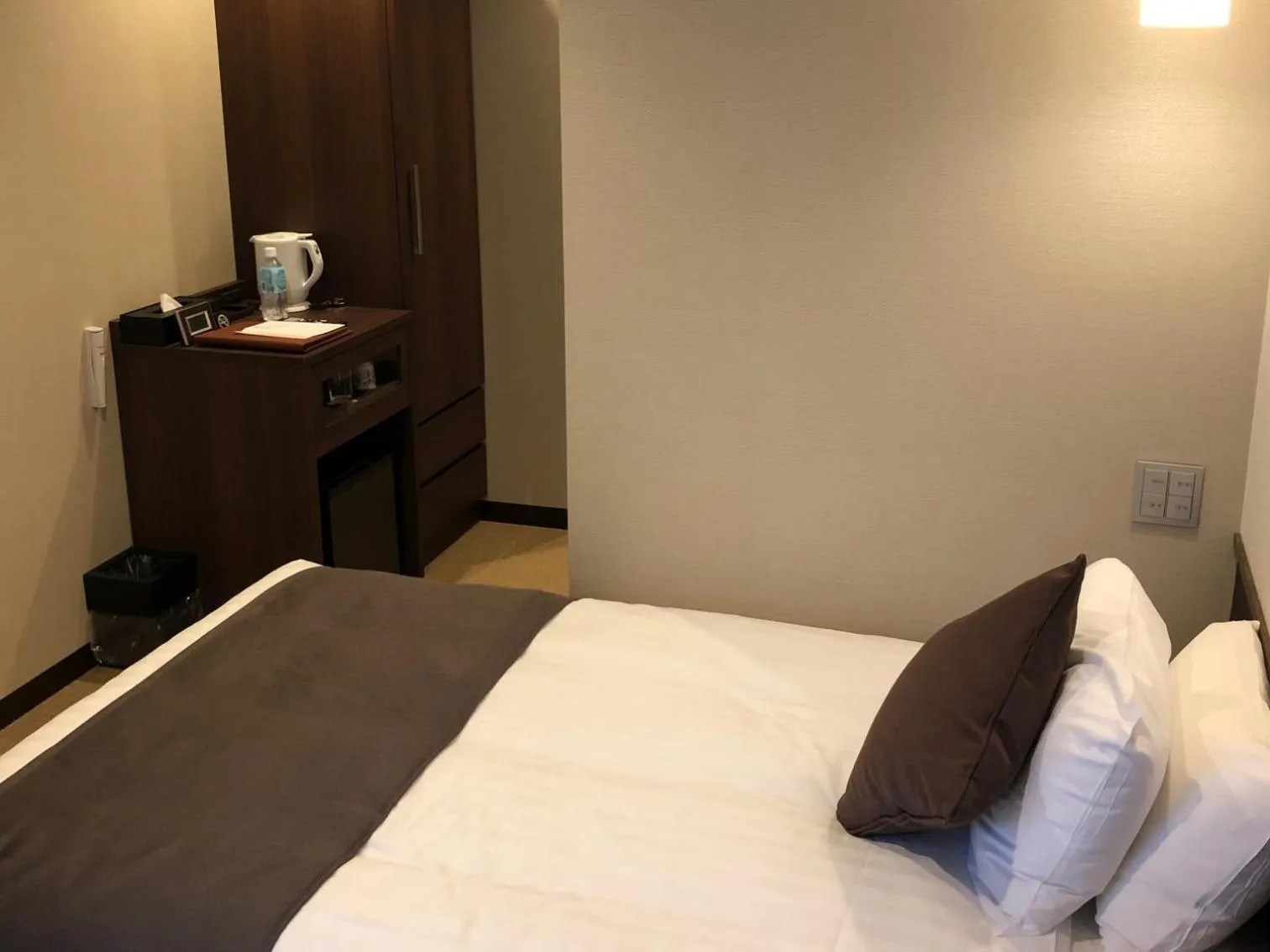 Bed in Iwakuni Kokusai Kanko Hotel