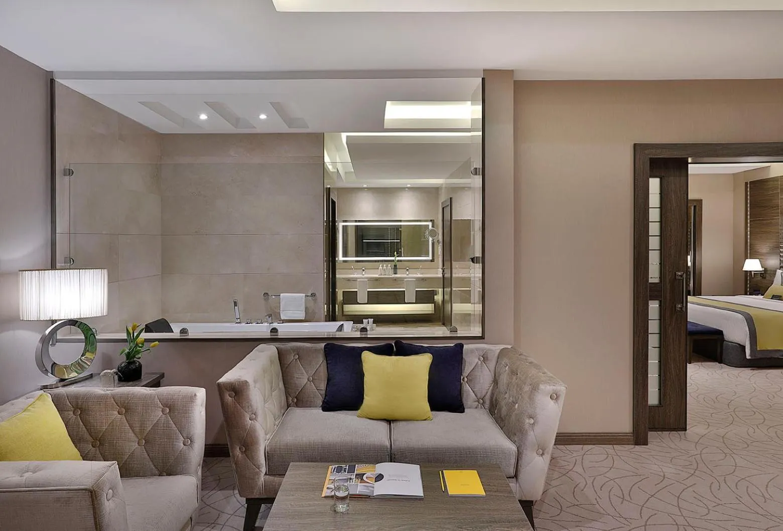 Living room, Bed in voco Al Khobar by IHG