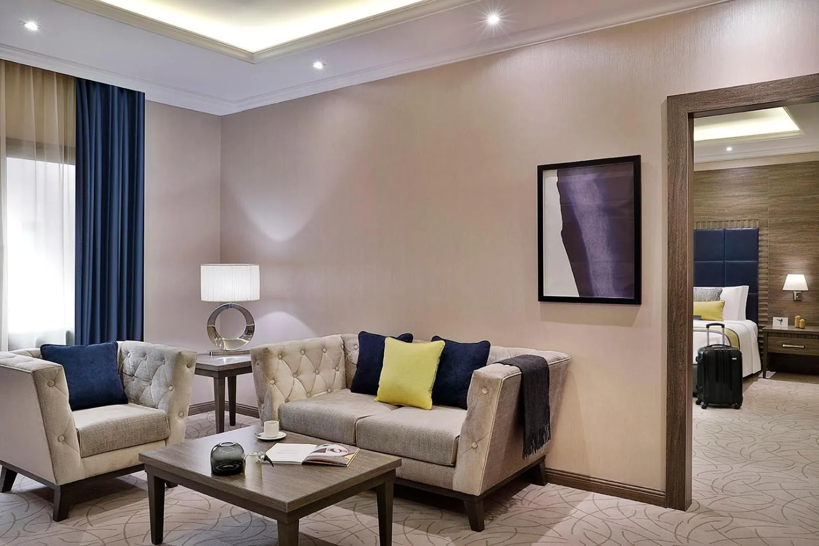 Living room, Bed in voco Al Khobar by IHG