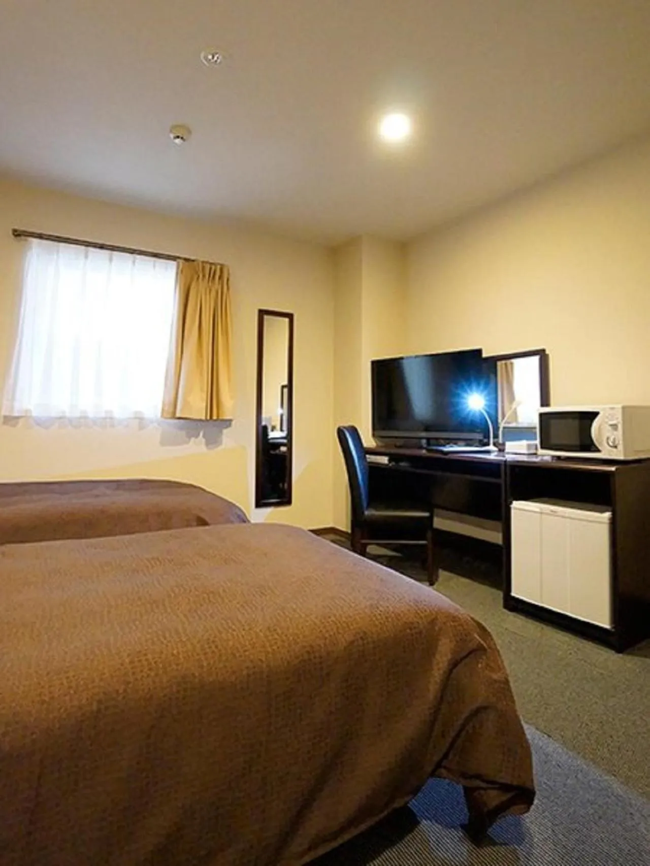 Photo of the whole room, Bed in HOTEL LiVEMAX Himeji Ekimae