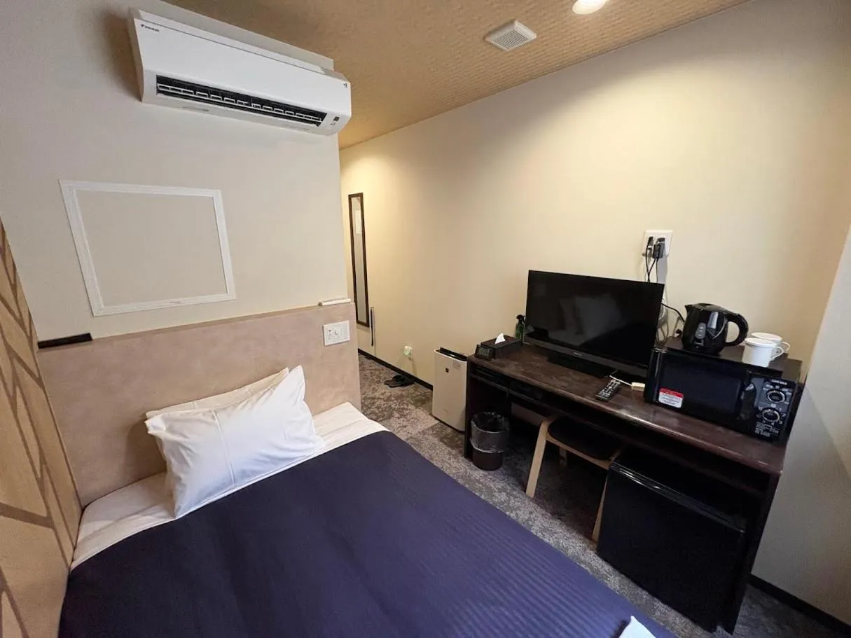 Bed in HOTEL LiVEMAX Himeji Ekimae