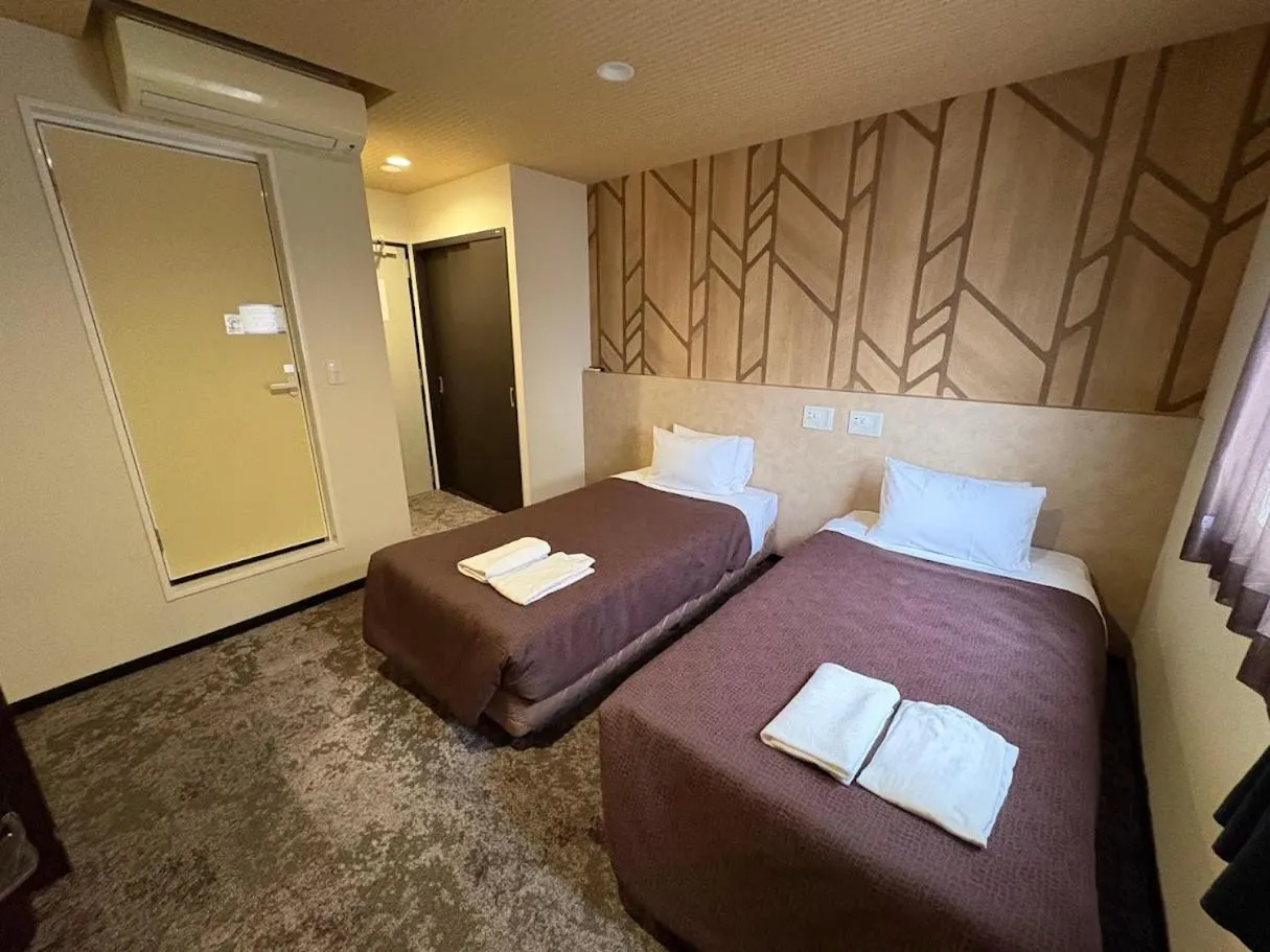 Bed in HOTEL LiVEMAX Himeji Ekimae