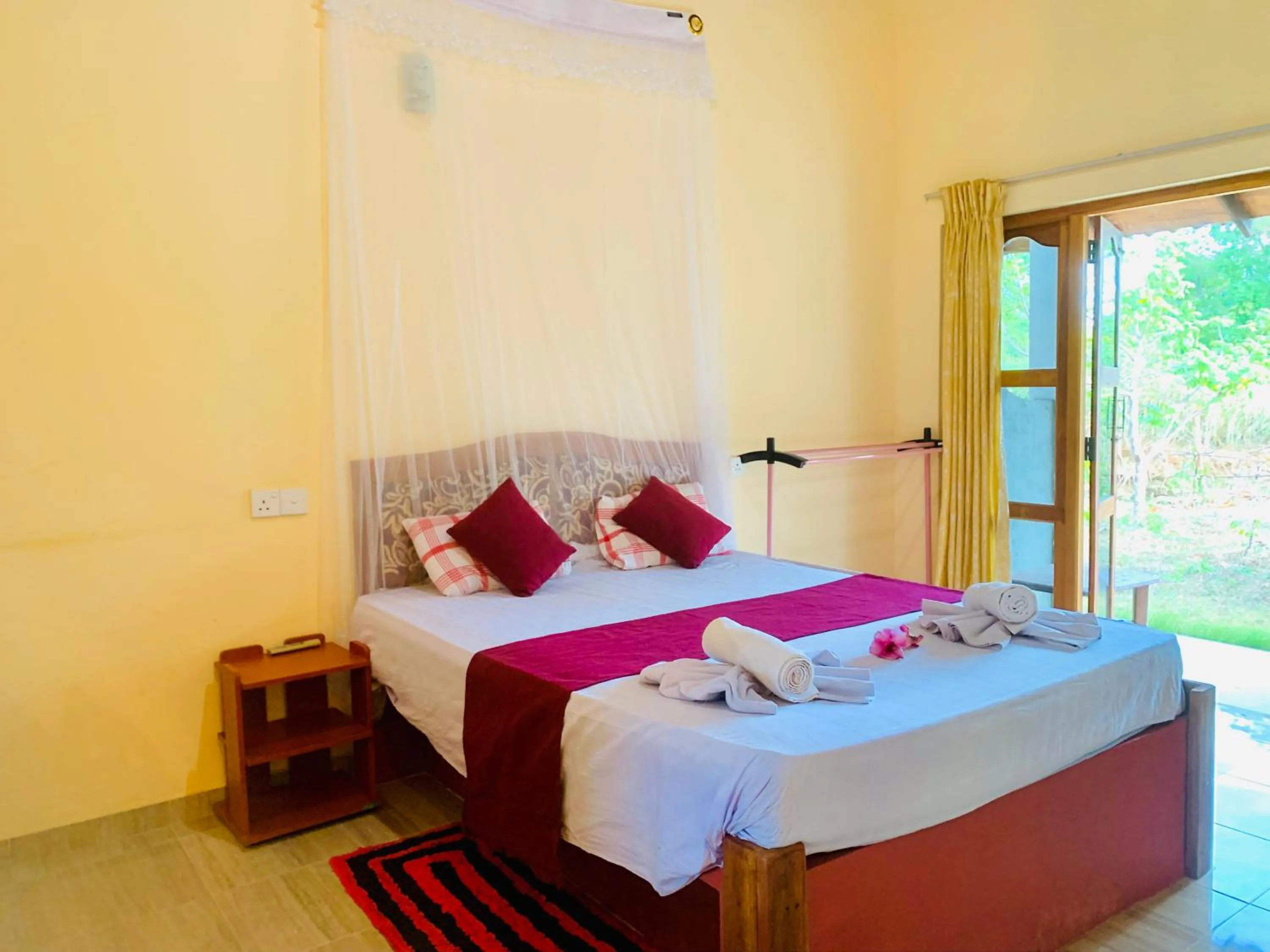 Photo of the whole room, Bed in Sinhagiri Villa