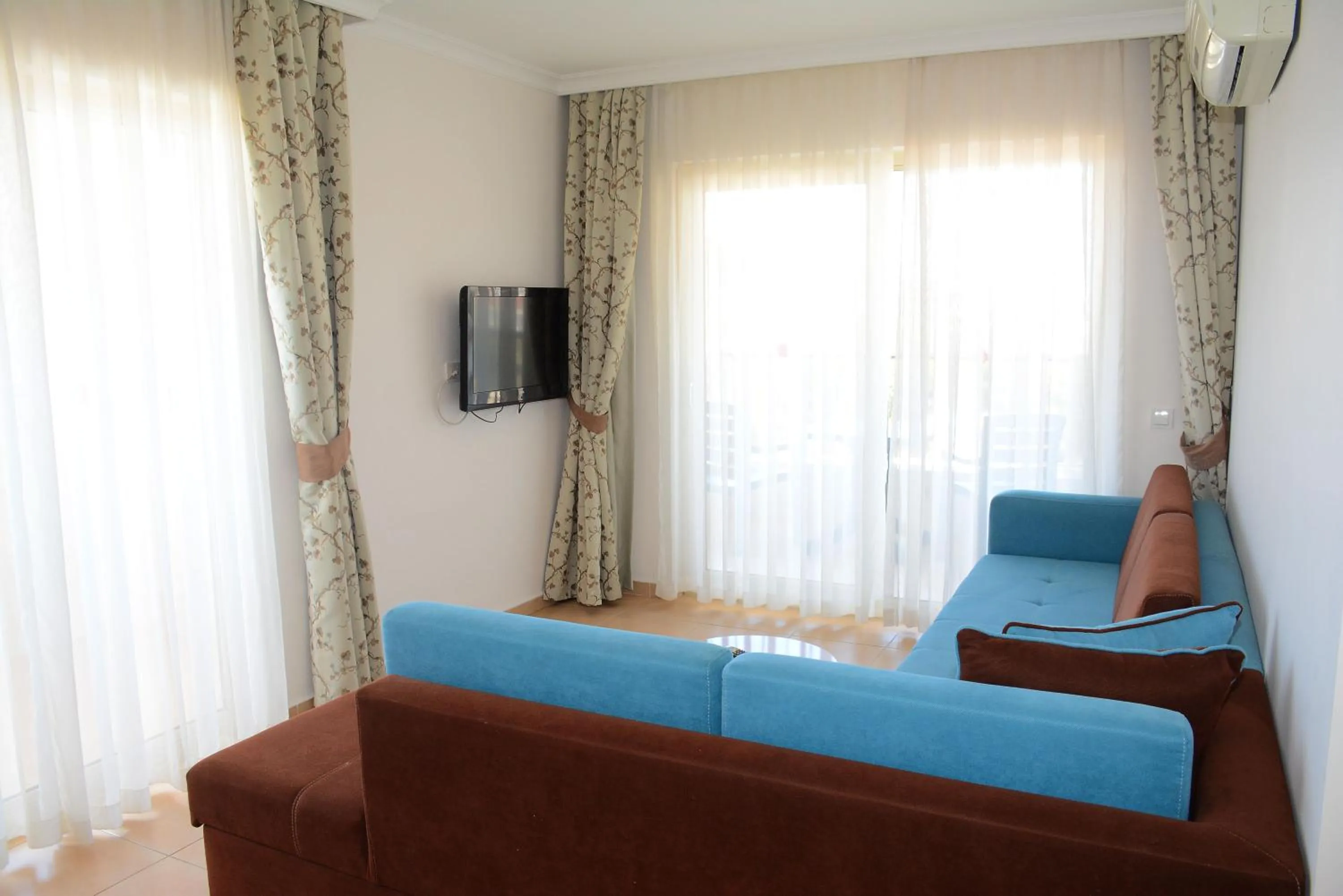 Living room in Almera Park Apart Hotel