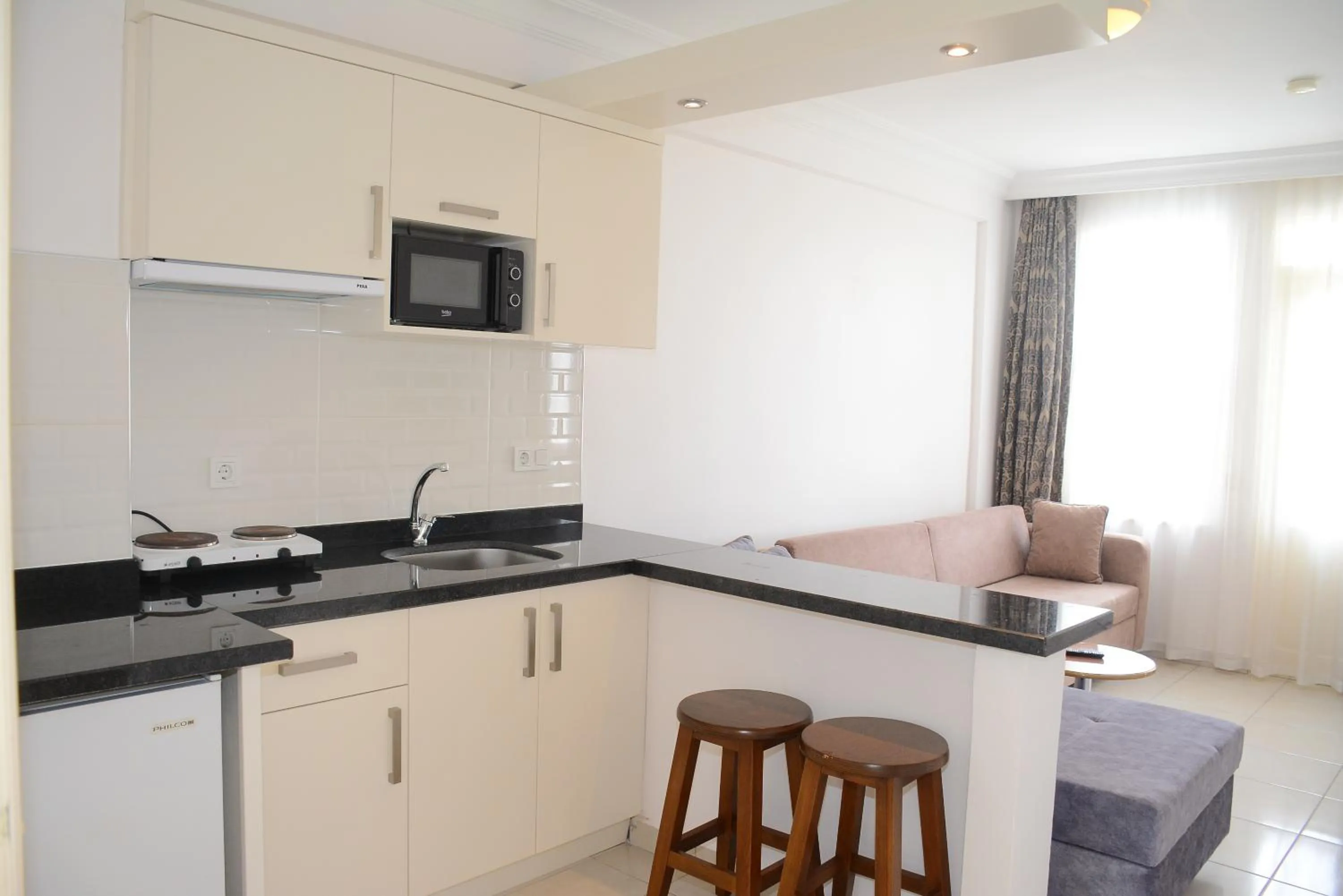 kitchen in Almera Park Apart Hotel