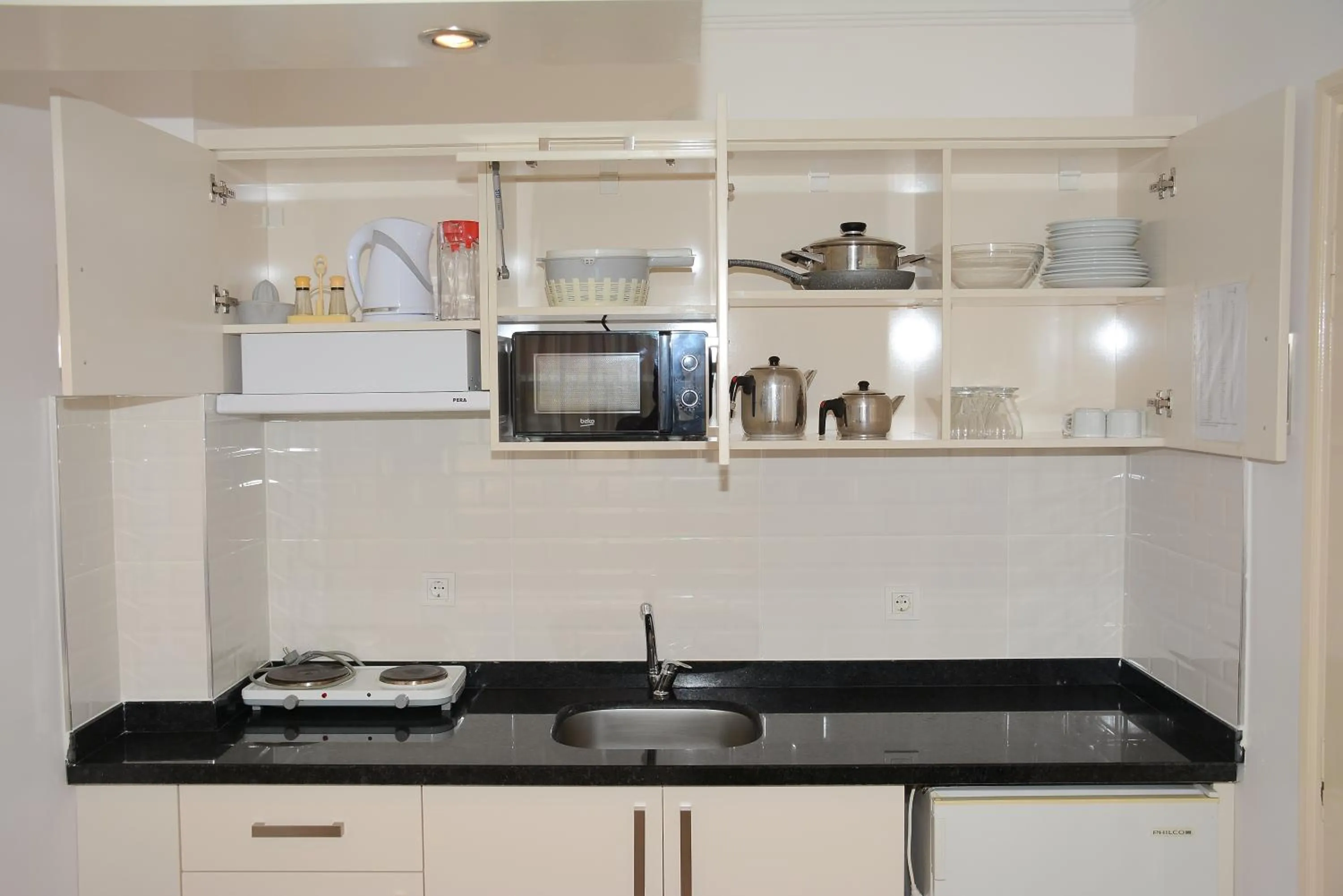 kitchen in Almera Park Apart Hotel
