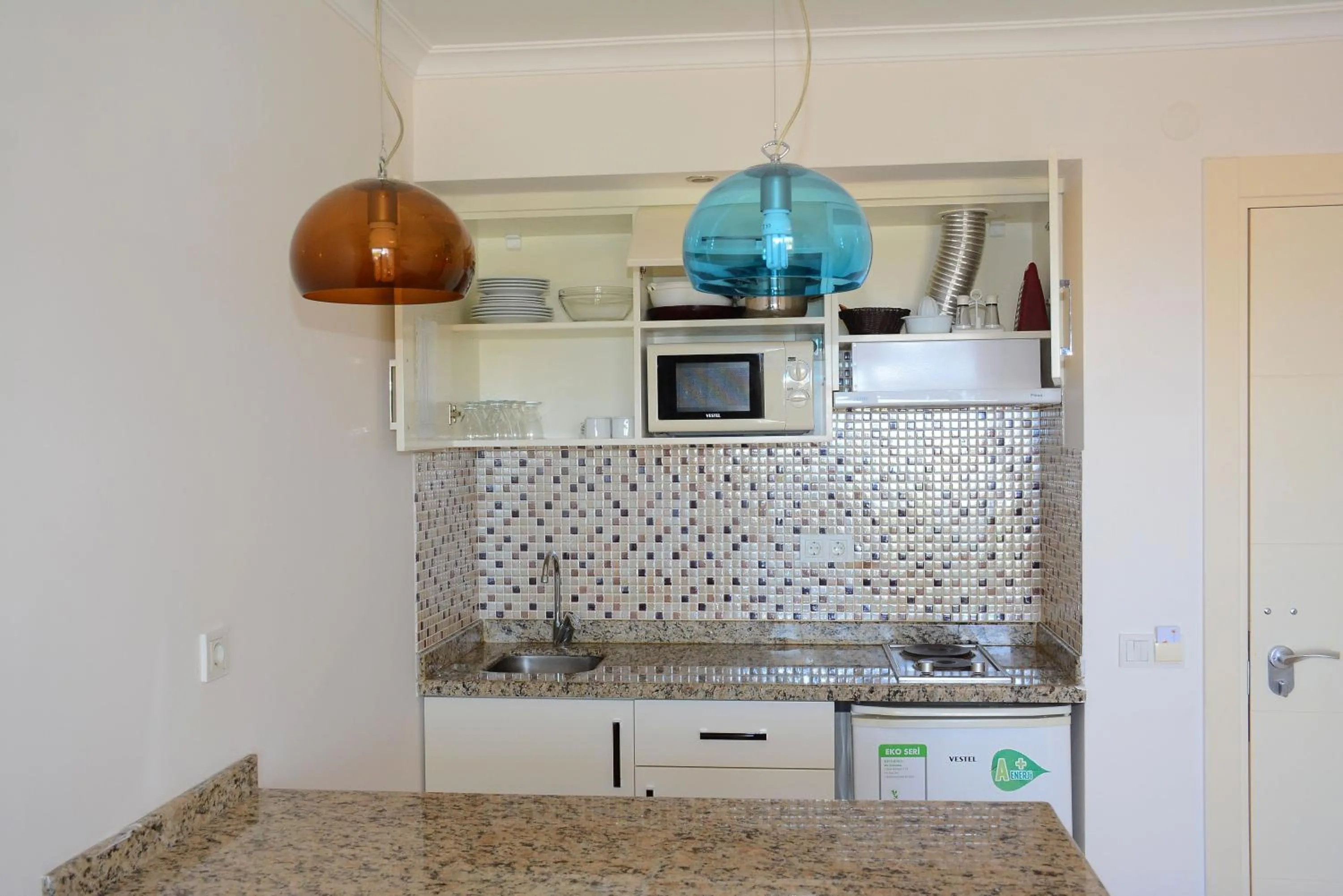 Kitchen or kitchenette in Almera Park Apart Hotel