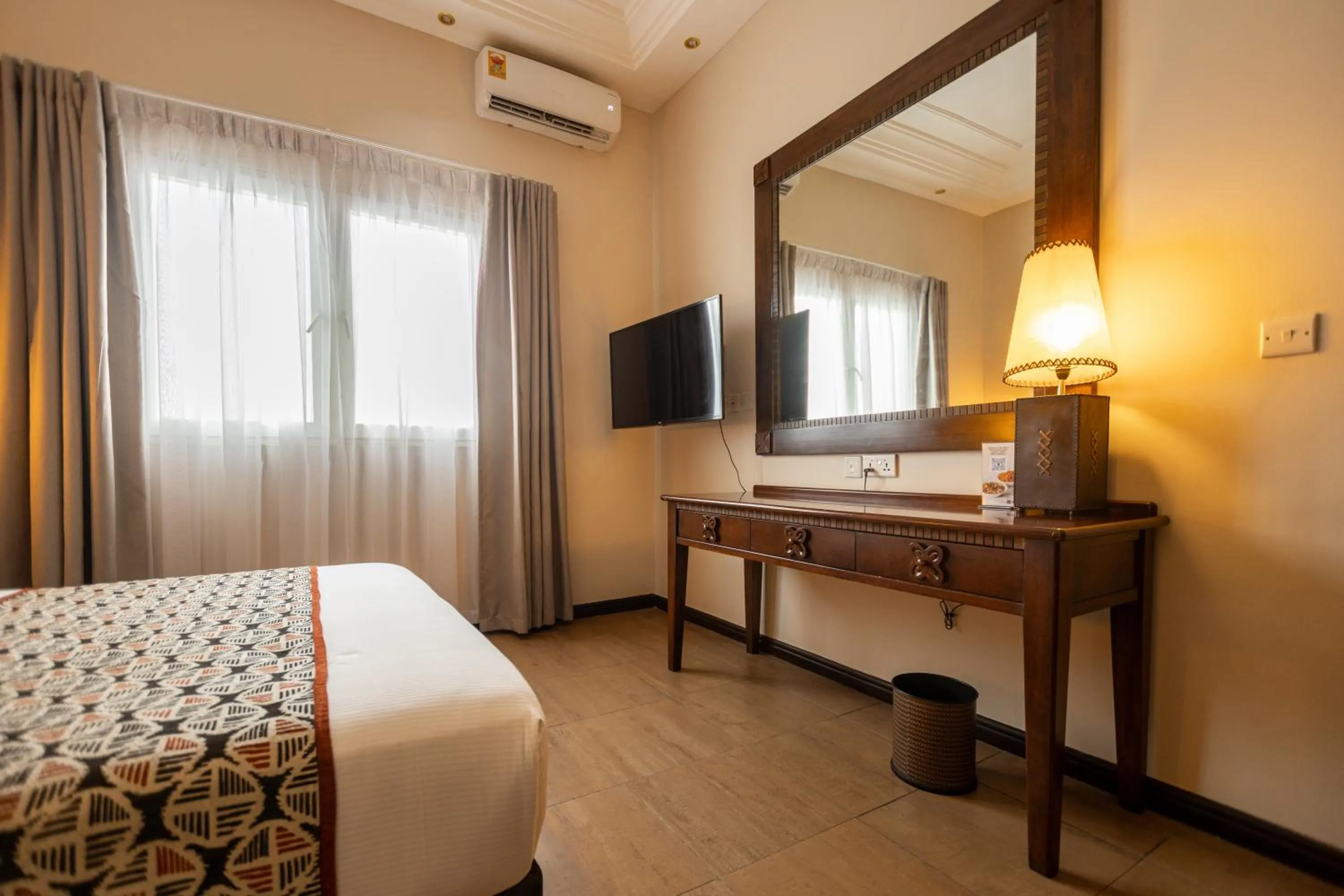 Bed in The African Regent Hotel