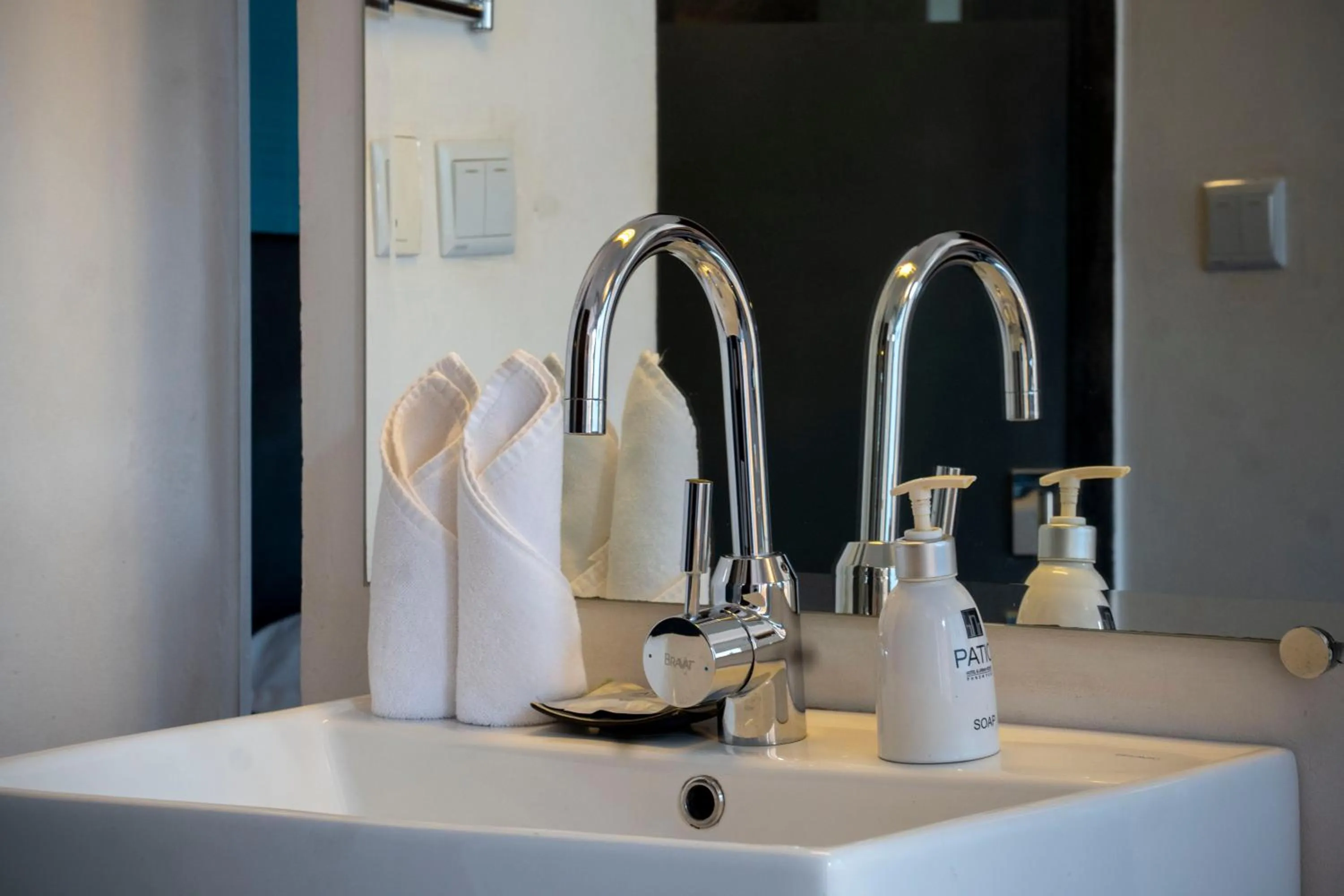 Bathroom in PATIO Hotel & Urban Resort