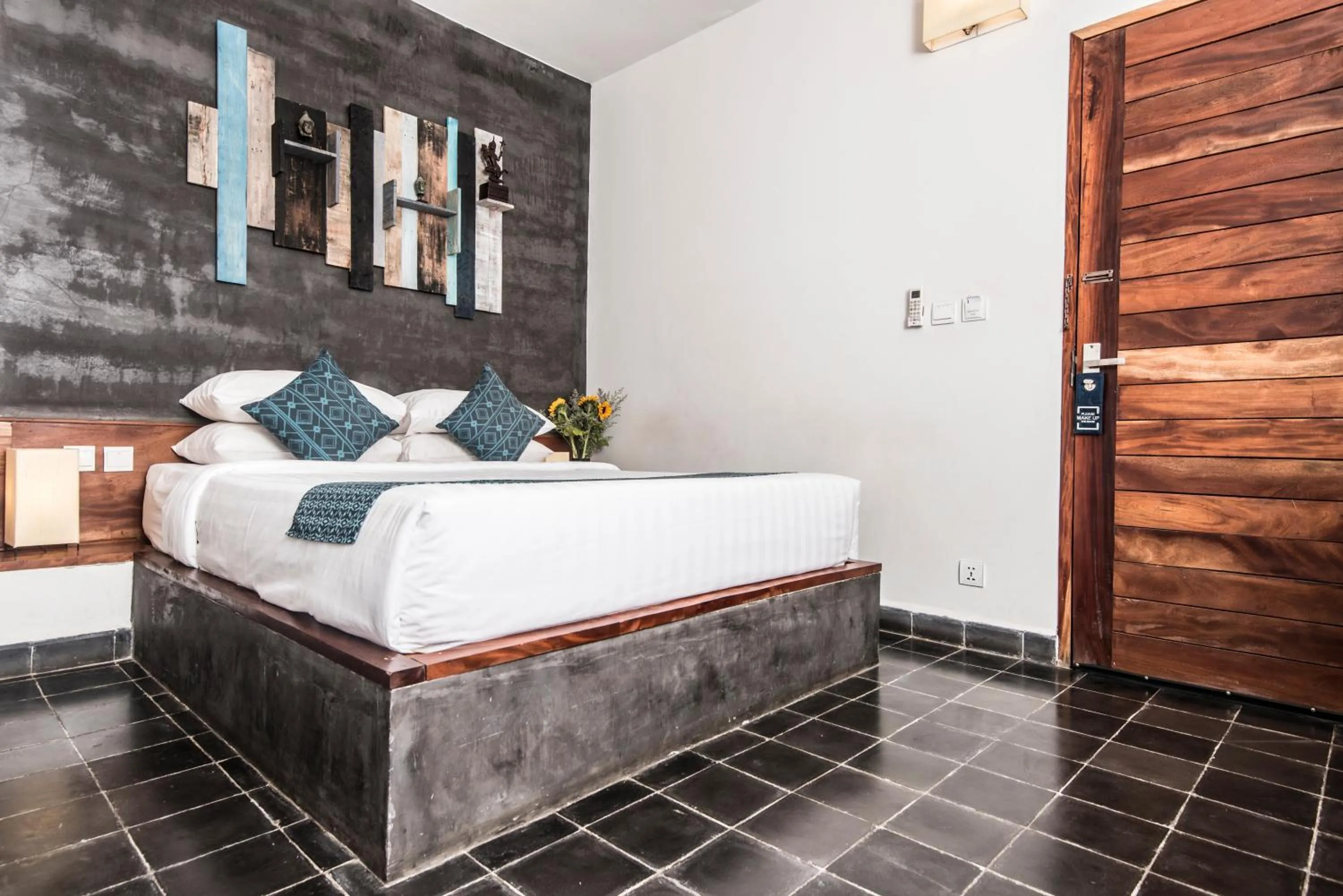 Bed in PATIO Hotel & Urban Resort