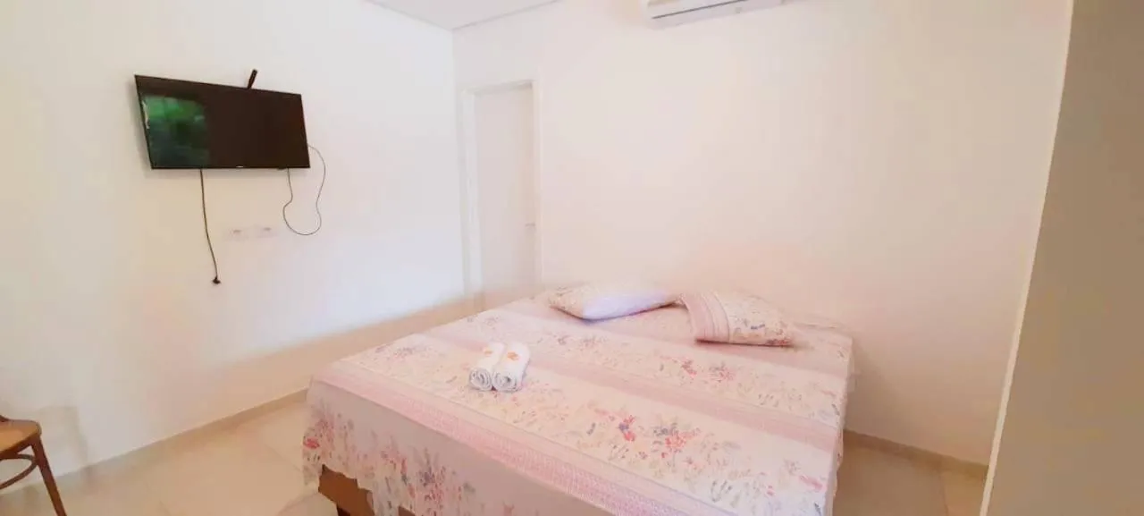 Bed in Pousada Pontal do Sul