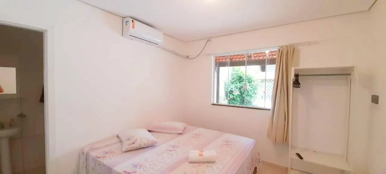 Bed in Pousada Pontal do Sul