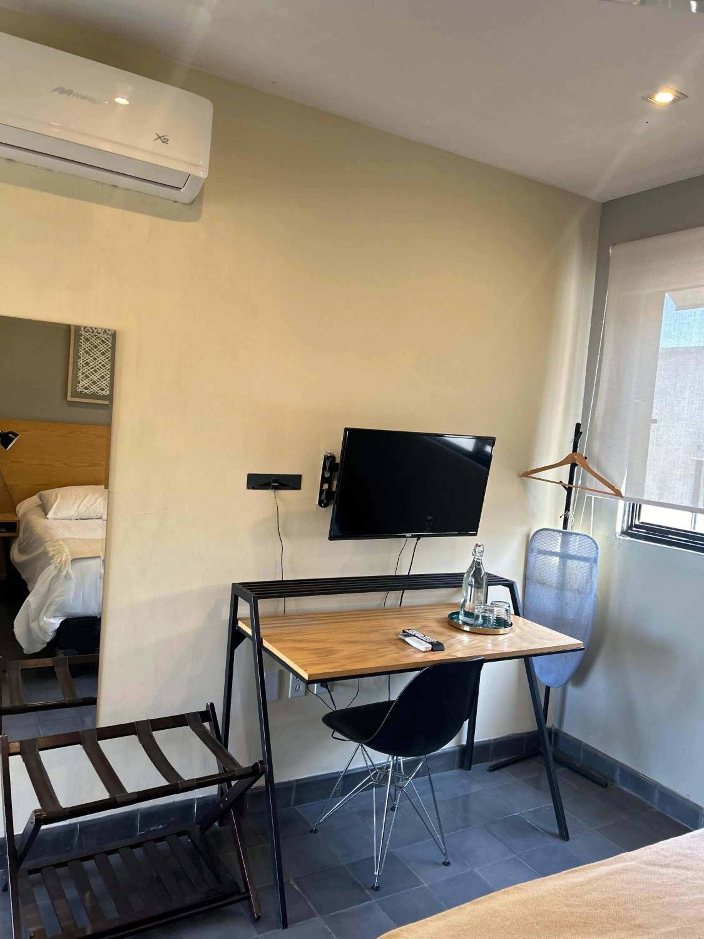 Seating area, Bed in Casa Alexia