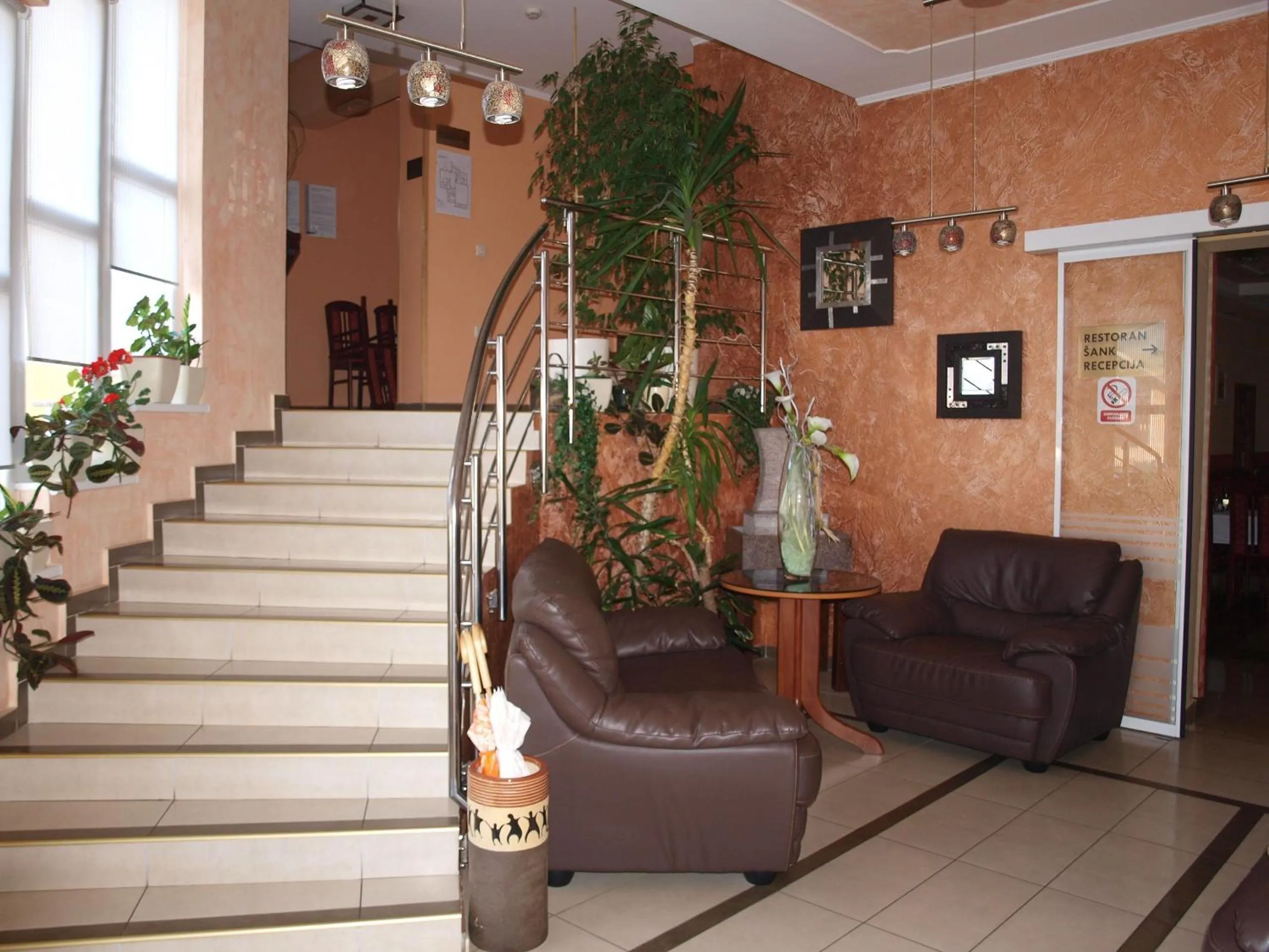 Communal lounge/ TV room in Hotel Orion