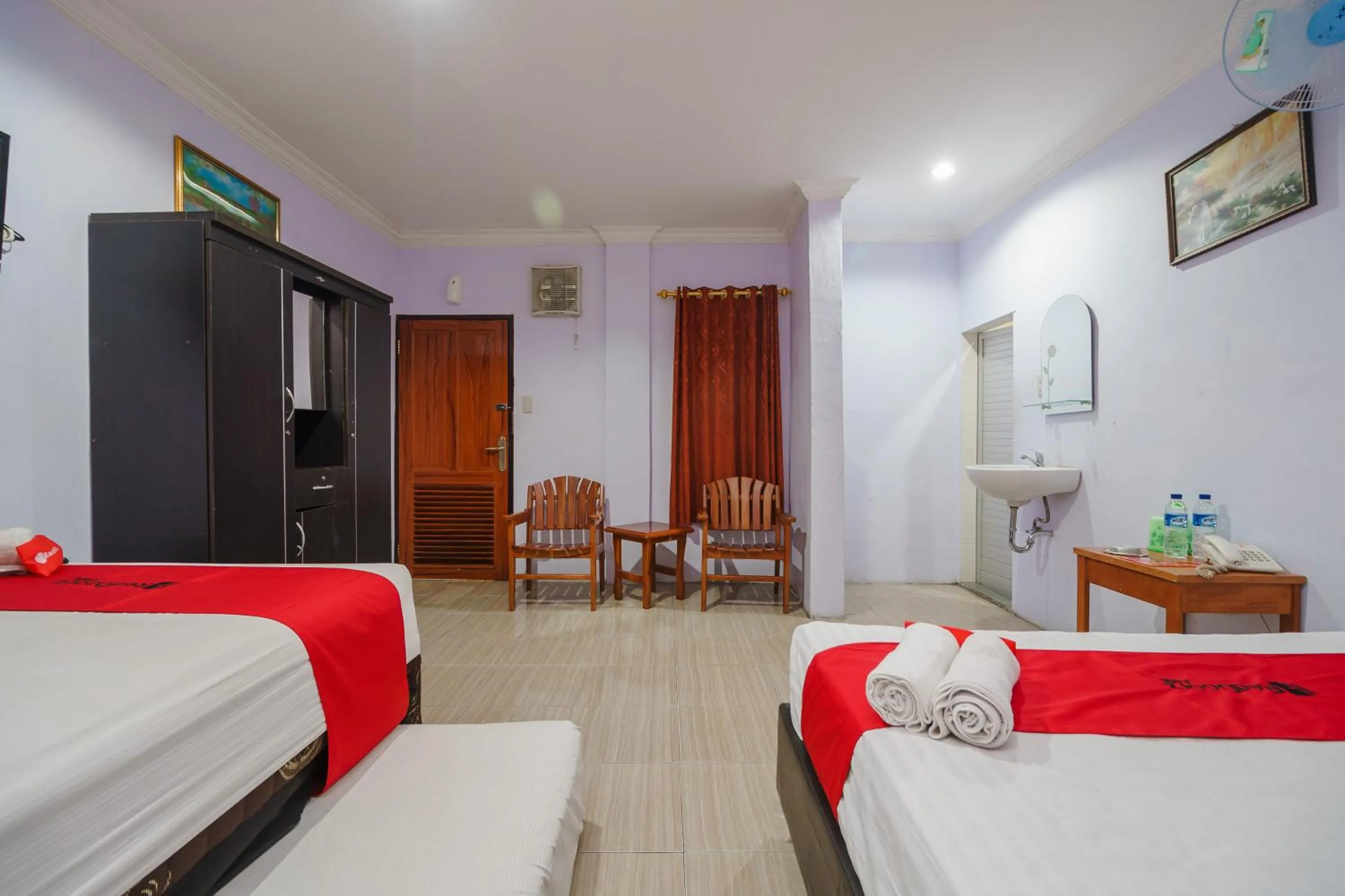 Bed in RedDoorz at Sedayu 2 Near Danau Toba Parapat