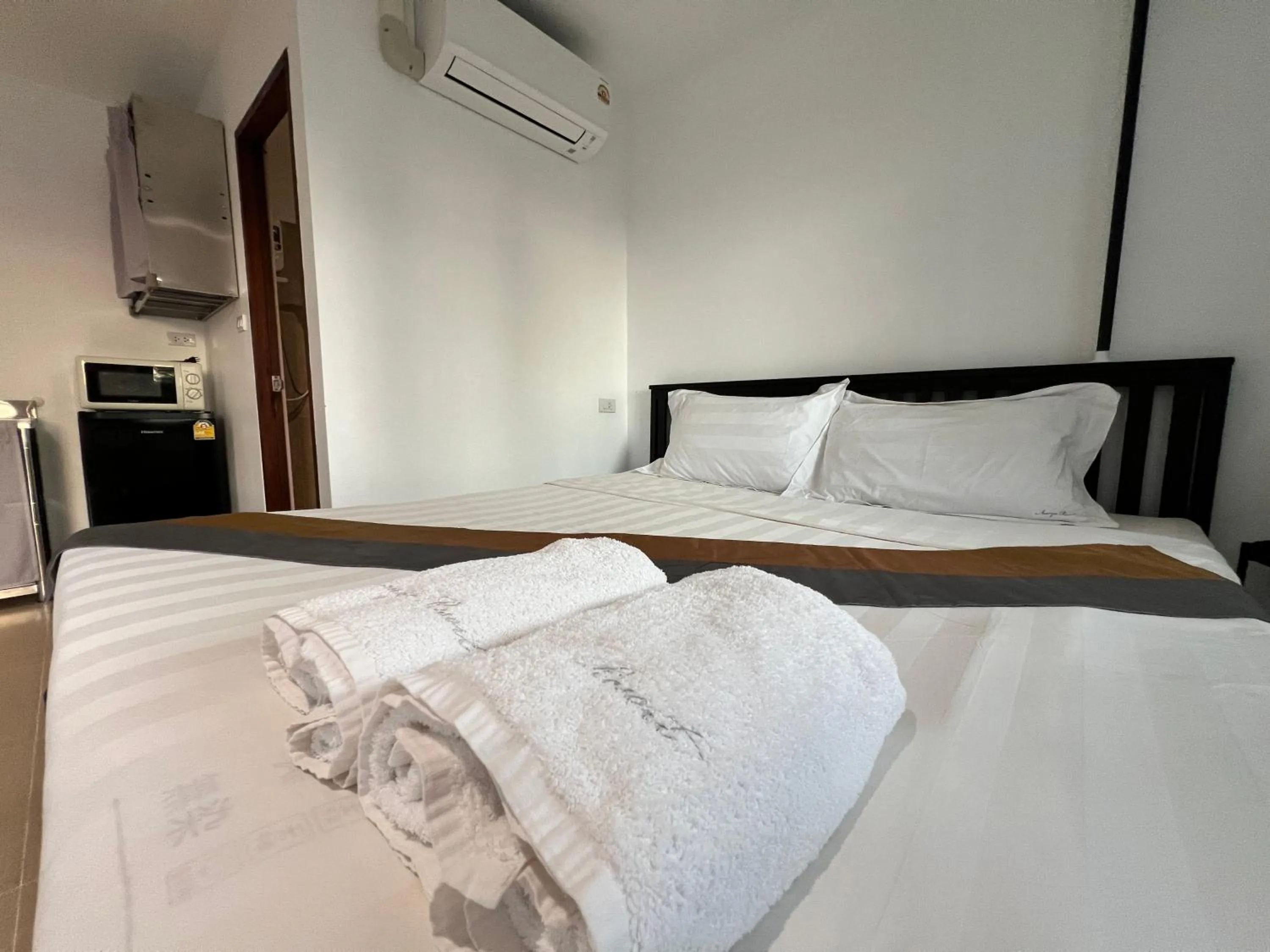 Bed in Aranya Resort Koh Lanta