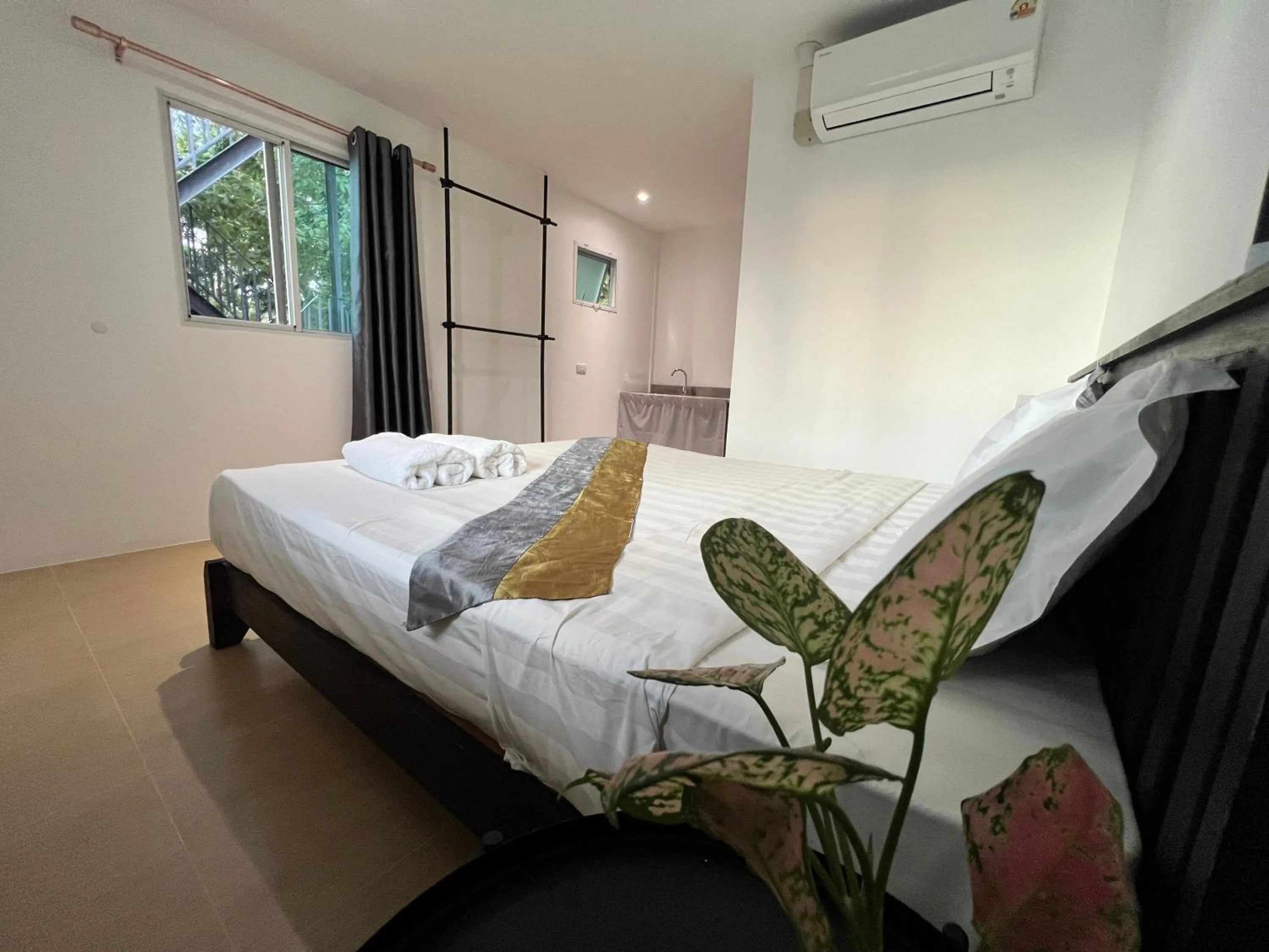 Bed in Aranya Resort Koh Lanta