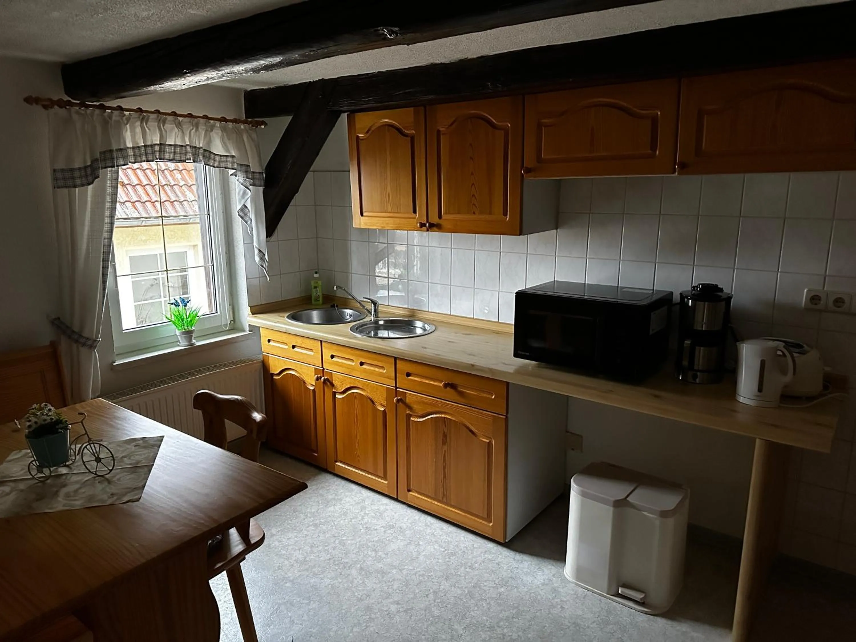 Kitchen or kitchenette in Pension Zum Fäßchen
