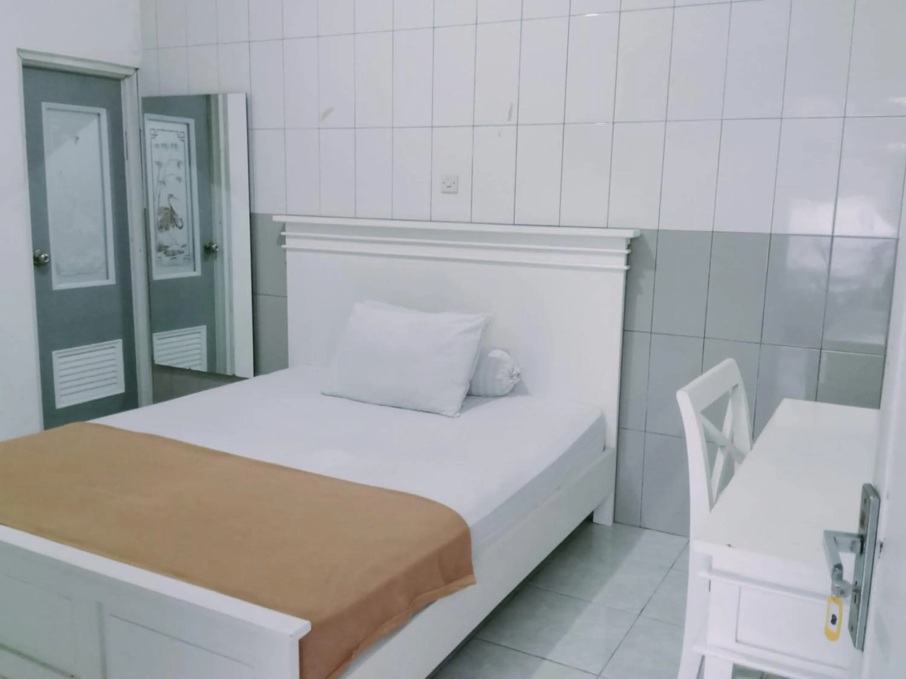 Bed in Ratu Guesthouse